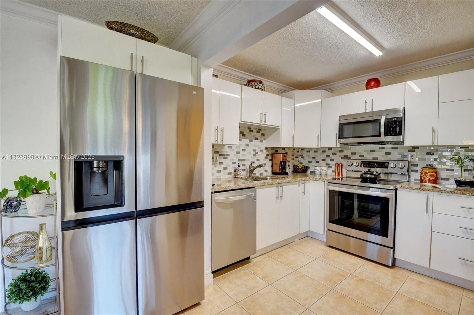 KINGS POINT BURGUNDY COND - Residential