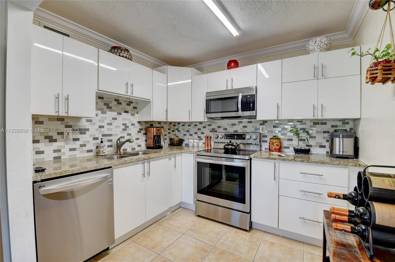 KINGS POINT BURGUNDY COND - Residential