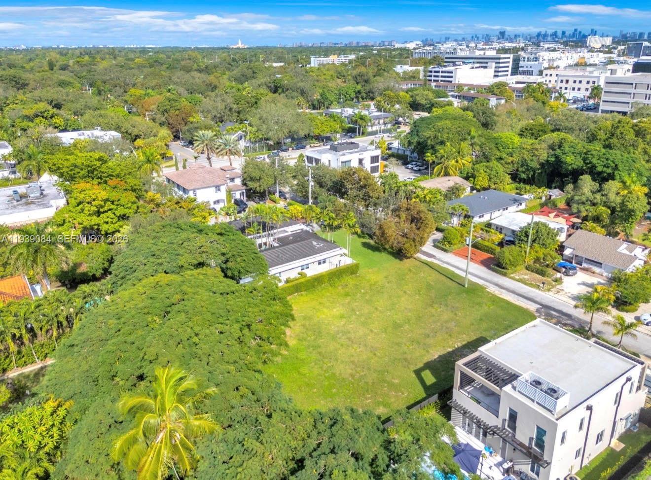 Oversized 14,000 SF lot in desirable South Miami. Two complete sets of architectural plans are available and approved by the city. Trees cleared with permits in place. Water service already installed, significant groundwork completed at seller’s expense, saving buyer time and cost.  Easy access to Coral Gables, Coconut Grove, and major roads. Ideal opportunity for custom new construction. Please submit offers with proof of funds or pre-approval. Contact listing agent for plans and due diligence information.