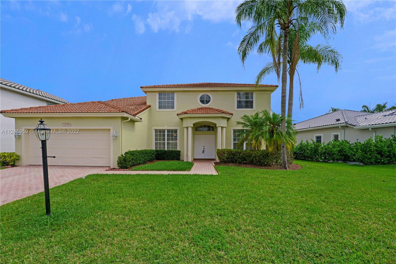 GORGEOUS SINGLE FAMILY HOME, 5/3 PLUS DEN WITH 2 CAR GARAGE, SCREENED POOL WITH JACUZZI, MASTER BED ON SECOND FLOOR, GUEST ROOM ON FIRST FLOOR W/BATH. FRESHLY PAINTED AND NEW LAMINATE FLOORS. BEAUTIFUL LAKE VIEW, GATED COMMUNITY W/SECURITY GUARD, ALL THE AMENITIES - 6 TENNIS COURTS, CLUBHOUSE, GYM. NEW KITCHEN CABINETS WITH WHITE COBBLESTONE COUNTER TOP, STAINLESS STEEL APPLIANCES, 3 DOORS REFRIGERATOR, DISHWASHER, COOK TOP WITH FILLED POT FAUCET AND DOUBLE WALL OVEN/MICROWAVE. TENANT IS RESPONSIBLE FOR WATER/SEWER/TRASH AND FOR POOL & LAWN SERVICE (OR CAN ADD $185 TO RENT AMOUNT FOR LANDLORD'S POOL & LAWN SERVICE). HOA APPROVAL PROCESS TAKES ABOUT 2 WEEKS.