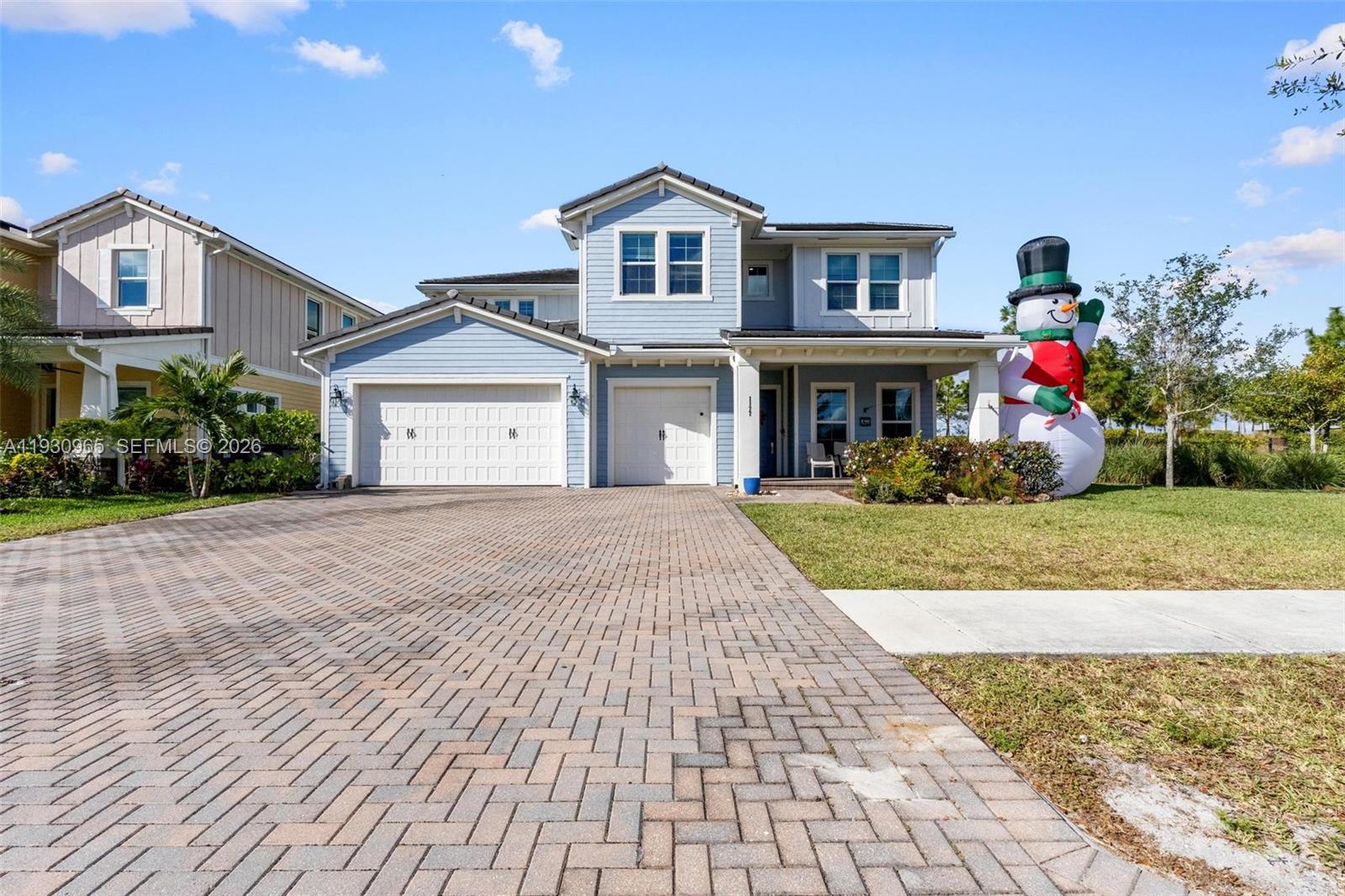 REDUCED BELOW APPRAISED VALUE FOR A QUICK SALE!! Welcome to this stunningly upgraded model home in the desirable Arden community of Loxahatchee, Florida. Boasting one of the largest floor plans in the neighborhood, this 2021-built, move-in-ready two-story residence offers an impressive 3,361 square feet of living space. Situated on a premium lot with spacing on both sides (not a zero-lot-line property), the home features 6 bedrooms, 4 full bathrooms, and a spacious 3-car garage. This residence has been thoughtfully enhanced with numerous high-quality upgrades, including a whole-home Generac generator system, a brand-new first-floor AC unit (complete with warranty), new epoxy flooring in the garage, new vinyl plank flooring throughout all bedrooms, stairs, and the second floor, new stainless steel appliances (washer, dryer, and dishwasher), new master bath flooring, and a fully repaired tile roof. The smart, functional layout is perfect for modern living and includes a convenient first-floor bedroom with a full bathroom—ideal for guests, multi-generational families, or an in-law suite. Enjoy resort-style living in Arden, a community celebrated for its exceptional amenities, picturesque natural surroundings, and prime location.
