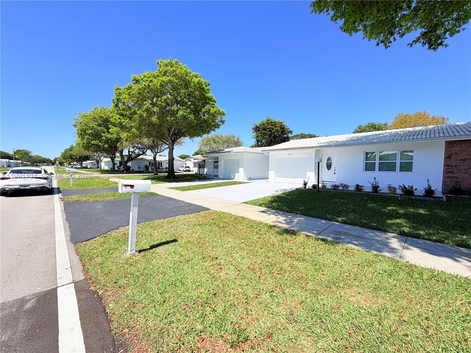 Reduced the price to sell.Welcome to your Florida retreat, Beautifully updated 2-bedroom, 2-bath single-family home located in a desirable 55+ community in the heart of Plantation. Enjoy an active lifestyle with access to a large clubhouse featuring a resort-style pool, library, card room, tennis courts, billiards, and more.
This home offers numerous upgrades, including impact windows and doors with permits, a new garage door with permit, Additional improvements include  new interior doors, baseboards, full interior paint, and modern blinds throughout. The home is also enhanced with updated electrical and plumbing fixtures, new appliances in kitchen.
Move-in ready and thoughtfully updated—perfect for comfortable, low-maintenance living in a vibrant community.