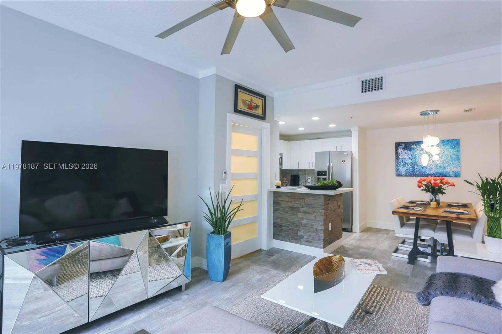 Turnkey fully furnished modern 3-level townhouse in the heart of Fort Lauderdale. Beautifully renovated 1BR/1BA with private 1-car garage (with washer and dryer), featuring high ceilings and designer interiors throughout. Upgrades include Italian ceramic tile flooring, quartz countertops, Carrara marble bathroom, remodeled kitchen and new appliances. Stylishly decorated with contemporary furniture and offered completely move-in ready.

The ground level features a private garage and entry, creating a versatile flex space ideal for a home office, studio, gym, or creative workspace.

Located in a gated community with heated pool and fitness center, just minutes from Las Olas, the beach, shopping, restaurants, and LA Fitness. Prime central location in the best school district in Broward within Harbordale Elementary boundaries and easy access to everything Fort Lauderdale has to offer.

Pet friendly community, dogs allowed up to 40 lbs. Perfect for end users, seasonal residents, or investors seeking a turnkey property in a highly desirable area.