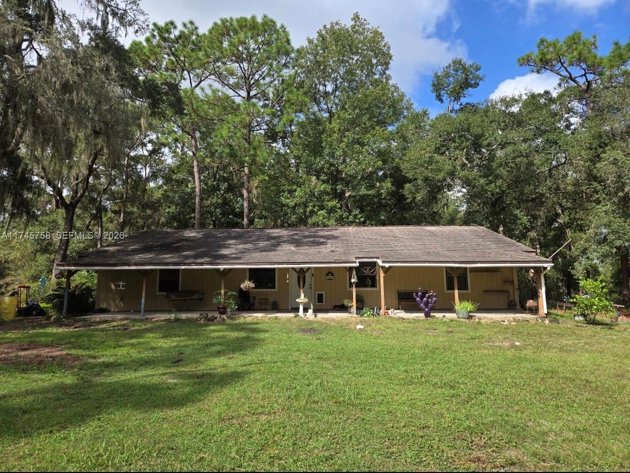 Price Reduced! Motivated Seller! Rare opportunity to own a CBS home on 10 private acres in Ocala. 3 bedrooms, 2.5 baths, approximately 2,200 sq ft with an updated kitchen. Property features a pool, workshop, and stalls. Exceptional space and versatility with ample room for toys, equipment, RVs, or outdoor lifestyle needs. Incredible potential to personalize and create your dream property. Seller says sell!