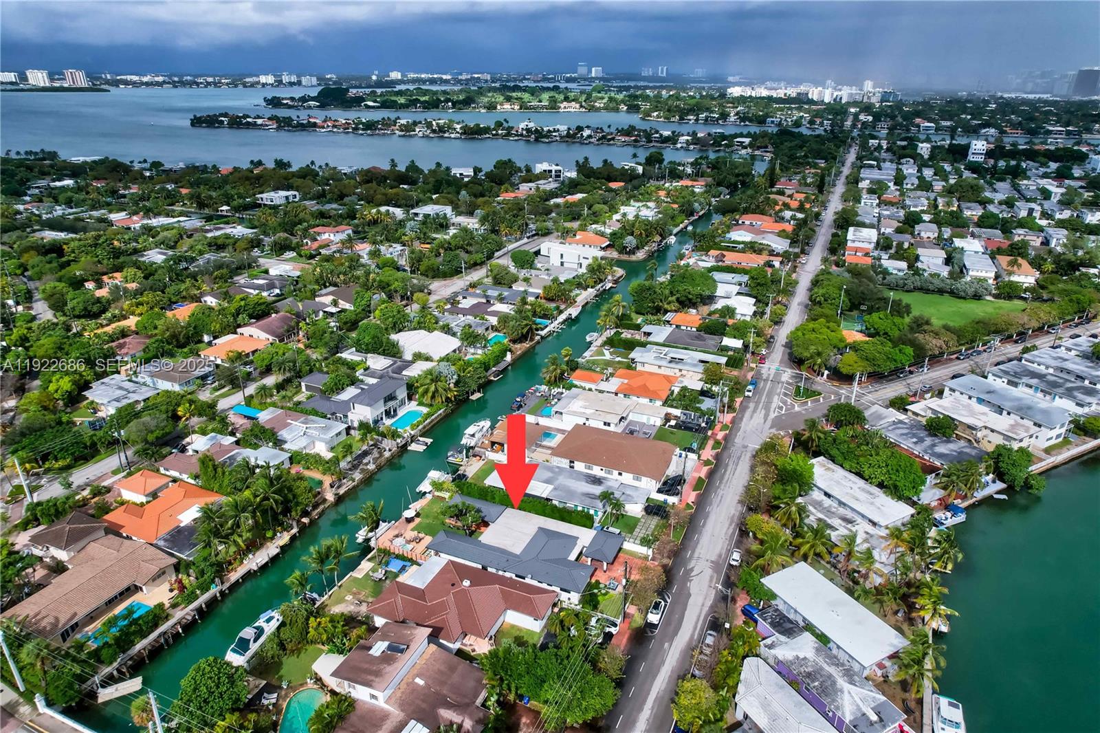 Discover the ultimate Boater’s Dream in comfort and convenience with this exceptional waterfront retreat direct access to open water, no bridges. This home is designed for those seeking a resort-style marine lifestyle. 5 bedrooms 5 baths (4 en-suite) with 3 separate entrances for guests or office. Larger than Tax Roll (2,730 SF as per Owner). Solid White Oak flooring throughout. Open Floor Plan combines kitchen, dining, living and family room into a single large space. Eurocraft Impact Doors and Windows throughout. Modern High-end gourmet kitchen features Twin Sub Zero 36" Refrigerator and 36" Freezer built-in, Bosch Dishwasher, Wolf oven, Thermador 36” induction cooktop, Concealed pantry and more. Within close proximity to Bal Harbor, South Beach, Mount Sinai and top-rated schools.
-The frontage features:
Design Landscape, two-car Carport plus 2 more car spaces, 250 square feet covered front porch and designer fountain
The backyard features: 60 feet water frontage, no fixed bridges, direct ocean access, 1,000+ square feet of covered terrace. Jet ski/Kayak platform with 3500 lift system included.
Summer kitchen with refrigerator, built-in grill natural gas. Wet Bar, Hot Tub, Natural Gas fire pit and shower.
-Security and other features:
Home Security Alarm system with security cameras and Video Recorder. Fiber optic internet. Generac Standby electric generator. Natural gas, too many things to mention. Call for an appointment now.