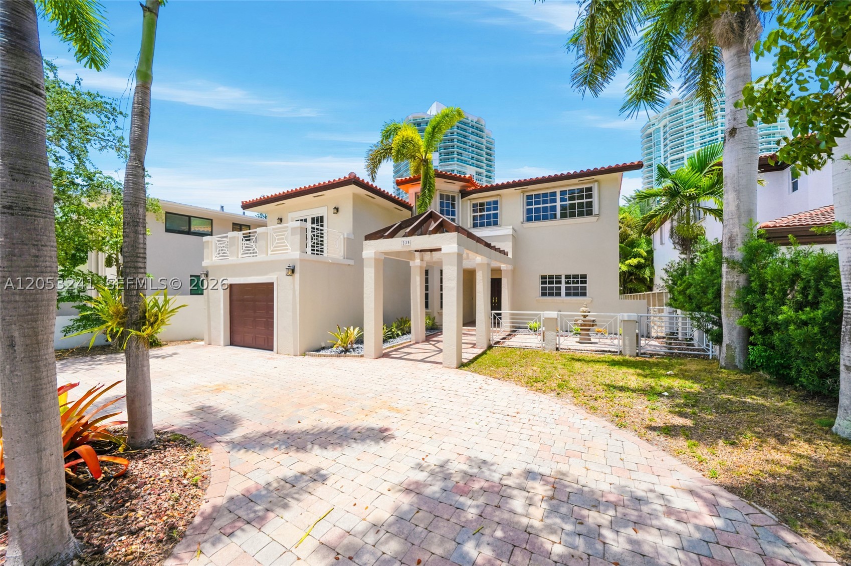 Experience the best of waterfront and beach living at 235 Atlantic Avenue, located on exclusive Atlantic Island in Sunny Isles Beach. Offering the rare combination of a private dock with a boat lift, direct ocean access with no fixed bridges, and deeded beach access just across the street, this property truly lets you enjoy the best of both worlds. The private beach access includes resident-only amenities such as storage and a barbecue/picnic area, making every beach day effortless. Inside, the home features a bright, open floor plan designed for everyday living and entertaining. Multiple gathering spaces include a spacious great room on the first floor and a media lounge upstairs, providing flexibility for a media room, game room, home office, or guest lounge. The expansive primary suite serves as a private retreat, complete with a sitting area or office, a wraparound balcony, and generous space to relax. Comfortable and well maintained, the home is move-in ready while offering an exceptional opportunity to renovate, reimagine, or build your dream waterfront residence in one of Sunny Isles Beach’s most sought-after neighborhoods. Whether you envision enjoying it exactly as it is or creating something entirely your own, this property offers endless possibilities in an unbeatable location. A rare opportunity to embrace the ultimate South Florida lifestyle, where boating and beach living come together in one exceptional property. Some photos have been virtually staged and/or digitally enhanced for marketing purposes.