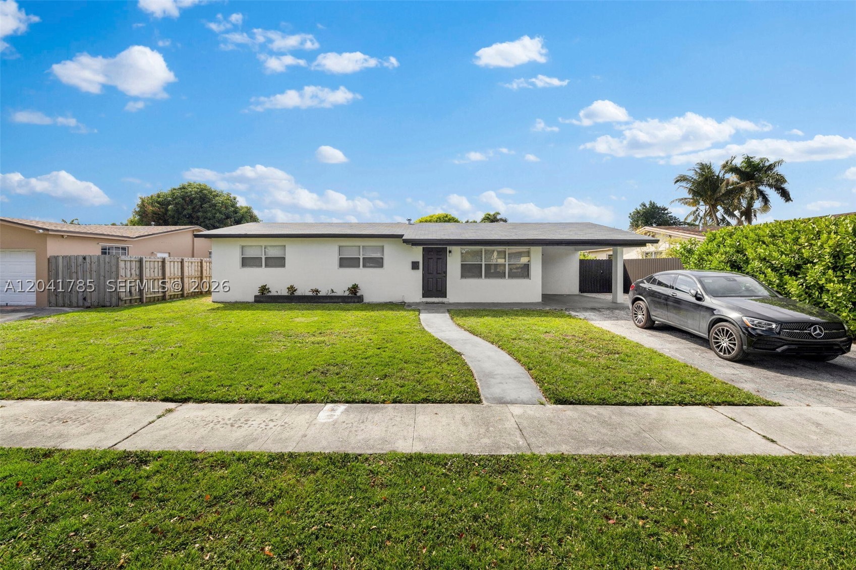 Welcome to this beautifully renovated single-family home in the heart of Pembroke Pines. This spacious property offers 3 bedrooms and 2 modern bathrooms, along with a separate private efficiency that includes its own bedroom, bathroom, and small living area—perfect for guests, in-laws, or a home office. The home has been fully updated and professionally decorated, creating a stylish and comfortable living space. It features a fully fenced yard, a covered carport, and additional driveway parking. Offered furnished at $4,300/month, unfurnished for $4,000. This move-in-ready home is available now.