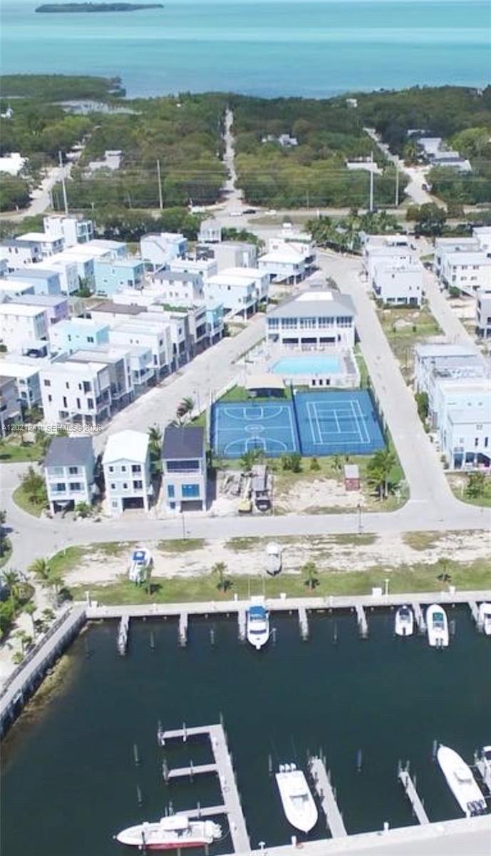 Build your dream home in paradise on this oversized corner lot in the heart of Key Largo. Ideally positioned next to the community clubhouse and tennis courts and directly across from the ocean, this prime homesite offers beautiful ocean views and an unbeatable location within a family-friendly community.
One of the larger lots in the neighborhood, this property provides added space and flexibility for your custom island retreat. This rare offering includes approved plans and permits — ready to build immediately, saving valuable time and expense in the Florida Keys building process.
Enjoy the perfect blend of coastal living, recreation, and convenience in one of Key Largo’s most desirable communities. Whether you’re planning a full-time residence, vacation getaway, or investment property, this exceptional lot offers the opportunity to create the Keys lifestyle you’ve been dreaming of.
