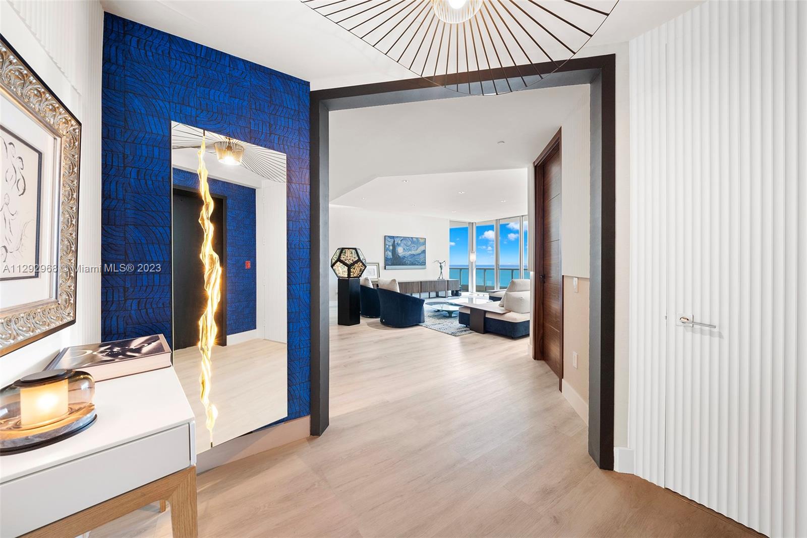 Designed for both beauty and functionality, this stunning oceanfront residence has been fully renovated to a high standard with exquisite attention to detail. Featuring a revised floor plan that maximizes natural light and views of the ocean and bay, new flooring, designer light fixtures, custom wall finishes, a brand-new kitchen with Miele and Liebherr appliances, custom doors throughout and more complemented by a vibrant interior design. Standout features include private elevator entry, smart home automation, media room/den, dining area, 3-beds/4.5 baths plus an additional staff room/office with full bath. Large oceanfront master bedroom features generously sized his and hers walk-in closets, direct access to the terrace and renovated master bath with walk-in shower and roman tub.