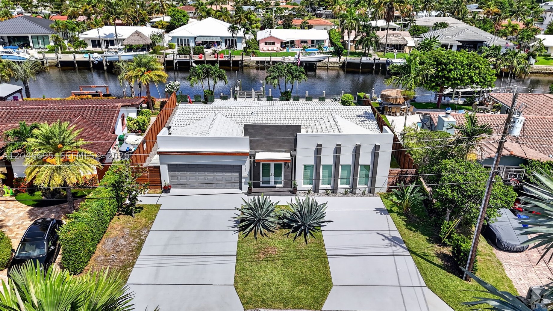 Coming soon to Pompano Beach is 966 SE 9th Ave, **Completely Re-constructed in 2016**, on 82 feet of water w/ ocean access on one of the widest canals.  Modern "South Beach" front design. Modern interior w/ expanded quartzite kitchen featuring extra large island, Impact windows & doors, Upgraded doors, closets, and baths. Extended covered entertainment space, gorgeous porcelain pool deck, heated pool, composite dock with 20K pound boat lift to enjoy the outdoors and coastal living. Owner's construction style was truly ahead of its time and now you can have this gem for less than the cost of new construction with similar finishes. Just 1 fixed bridge (US-1) away from the ocean, the location and lifestyle is superb. Enjoy the dining, entertainment at the Pompano pier and be close to the future Pompano Beach Downtown district, which will boost property values and feature nine acres of green space, a central waterscape, and a walkable community w/ dining, shopping, entertainment, and cultural events that will redefine the area.