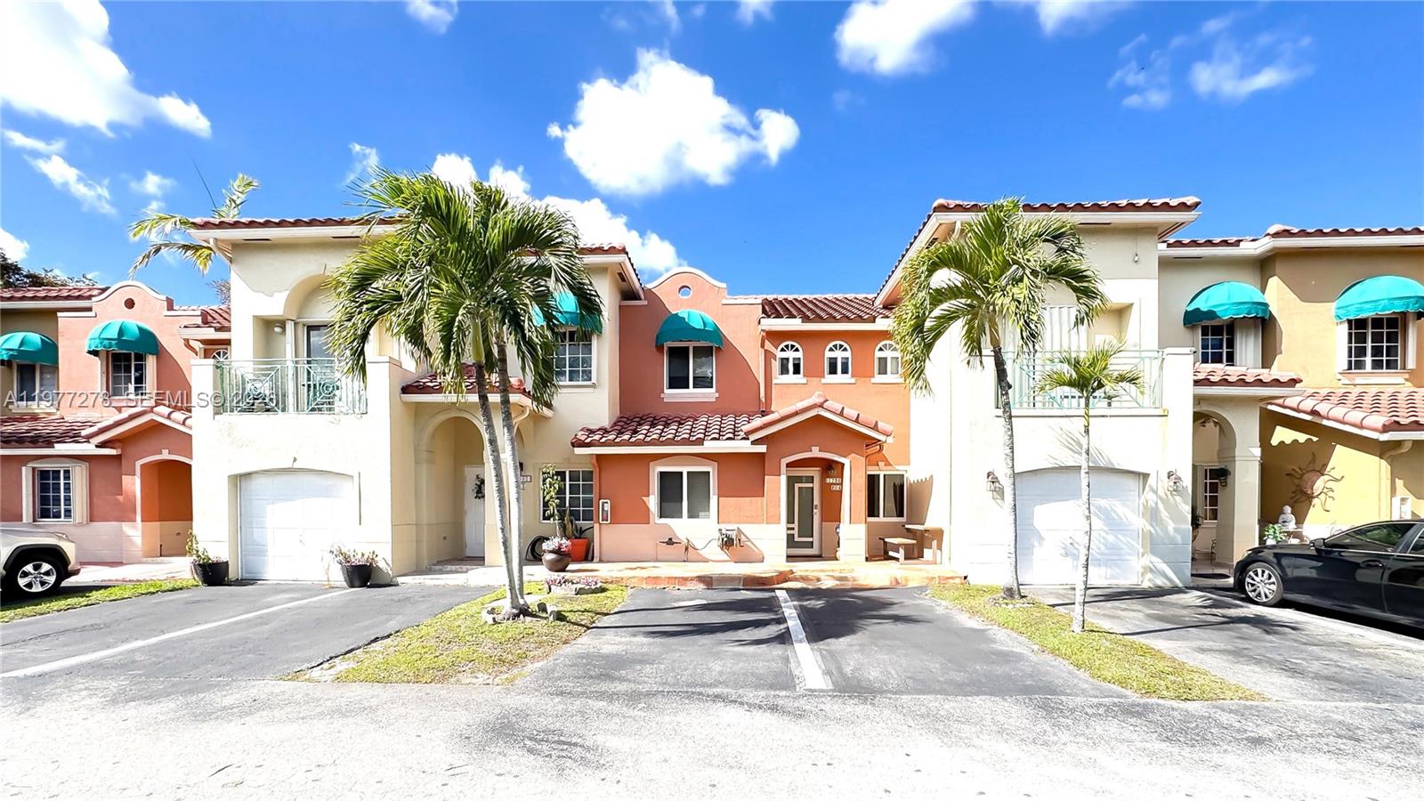 For Rent. Rarely available townhouse-style condo in Bonita Golf View Townvillas Stage I, with beautiful lake views. Prime location just 3–5 minutes from Palmetto Expressway (826), I-75 and Okeechobee Rd, offering quick access throughout Miami. Approximately 25 minutes to Miami International Airport, 5 minutes Miami Lakes Main Street, and about 30–35 minutes to Miami Beach. Spacious and well-maintained, featuring 3 bedrooms plus a versatile loft/office. Enjoy a private covered patio overlooking the lake and water views from the primary bedroom. Two assigned parking spaces directly in front of the unit plus guest parking nearby. Functional layout in a small, well-kept community. Move-in ready.
