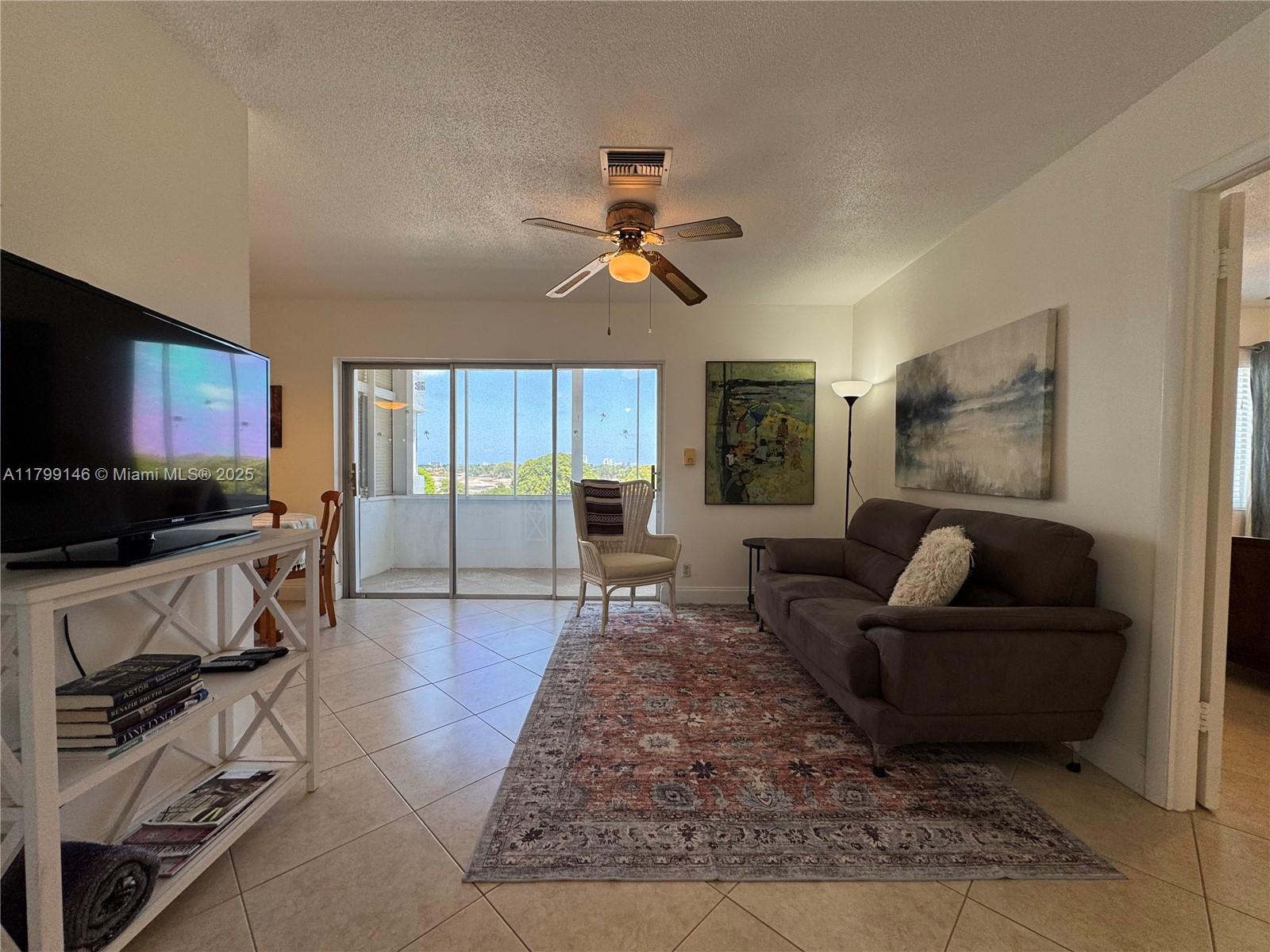 Location, Location, VIEW! 1-bedroom unit with gorgeous views of golf course, located just blocks from Downtown Hollywood's new Publix, Circ Hotel, Young Circle ArtsPark, shops & restaurants. This renovated unit features ceramic tile floors, an updated bathroom with shower, tankless hot water heater. Enjoy the morning sun on spacious screened balcony. Located east of US-1 in Hollywood Lakes across from the updated Hollywood Golf Course and soon-to-open clubhouse/restaurant. Take the shuttle service to Hollywood Beach. Recent building upgrades include a new elevator, fire alarms, exterior paint, new piping, and new paving in all parking areas. Membrane roof is being replaced with a special assessment that seller is paying. 40-year certification done and no other special assessments. One unassigned parking space. Buyers under 55 can be approved.