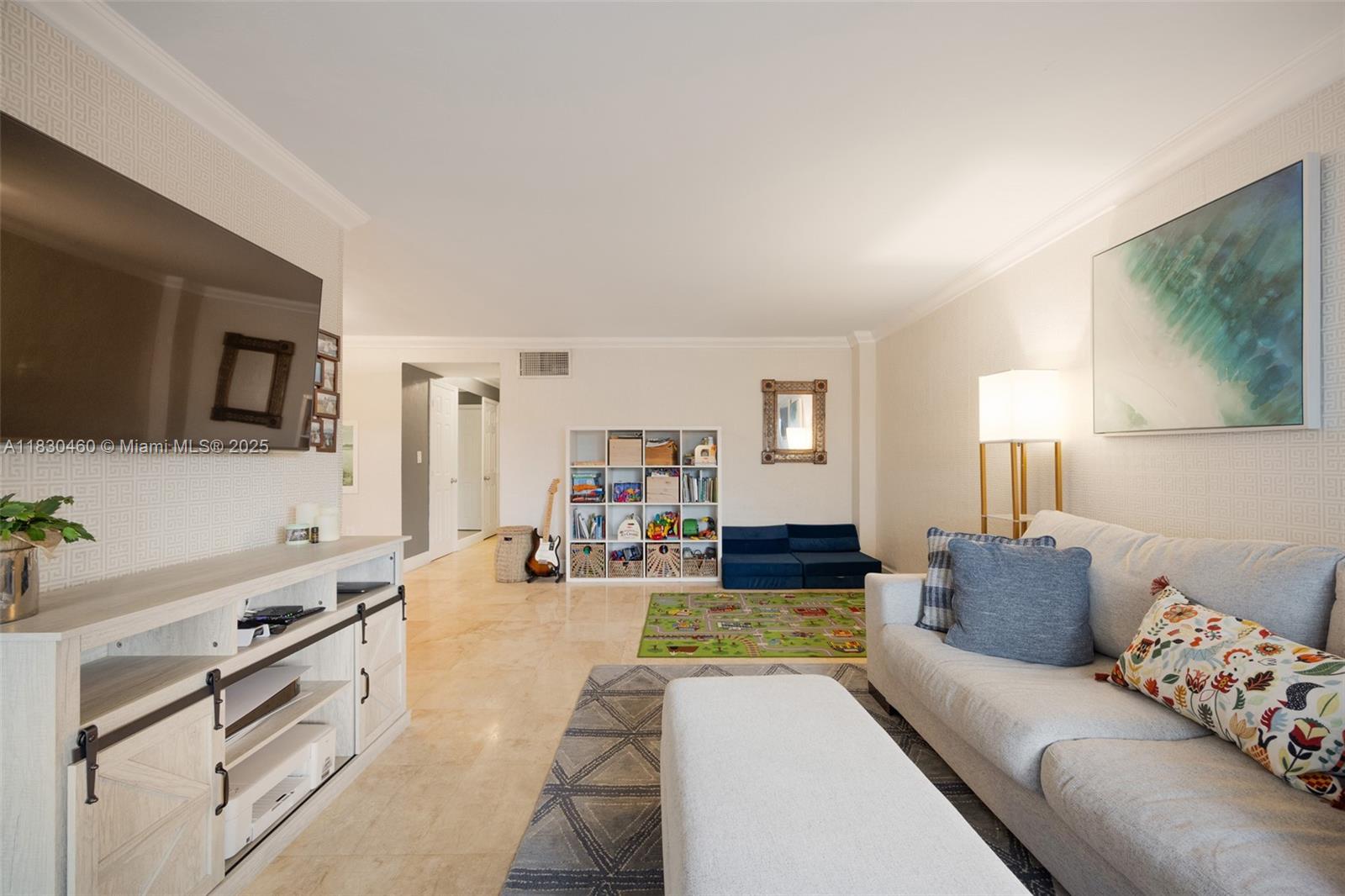 Spacious South Beach retreat featuring an oversized 1-bedroom plus a versatile den/flex space. Enjoy elegant marble floors, a remodeled kitchen and bath, and two private balconies for seamless indoor/outdoor living. This bright, top-floor residence includes impact windows, elevator access, and one gated parking space. WiFi is included. Ideally located just blocks from Flamingo Park, Whole Foods, and the beach—experience walkable convenience in a prime Miami Beach setting. Offered furnished or unfurnished.