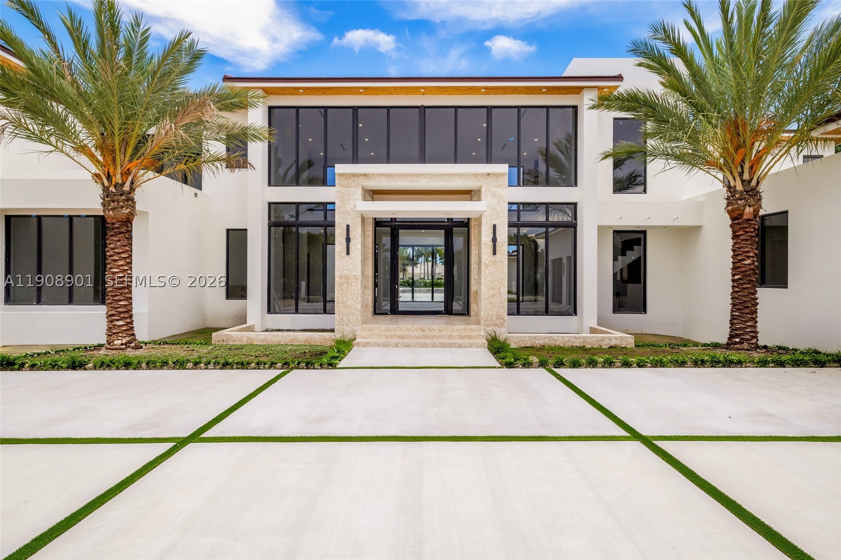 This brand-new masterpiece set on over an acre of land, located on the beautiful, scenic Old Cutler Road features 9 bedrooms and 9 1/2 bathrooms across 11,011 SF. The newly-constructed residence blends sophistication and modern comfort with floor-to-ceiling windows, marble baths, and seamless indoor-outdoor living. The gourmet kitchen includes Subzero refrigeration, Wolf appliances, and custom wood cabinetry. Enjoy covered terraces, a heated pool and jacuzzi, summer kitchen, and smart home technology. Additional highlights include an elevator, guest house/exercise room, movie/game room, and a 3 car garage with space for parking lifts—a true showcase of refined craftsmanship and contemporary design. Estimated completion will be February 2026