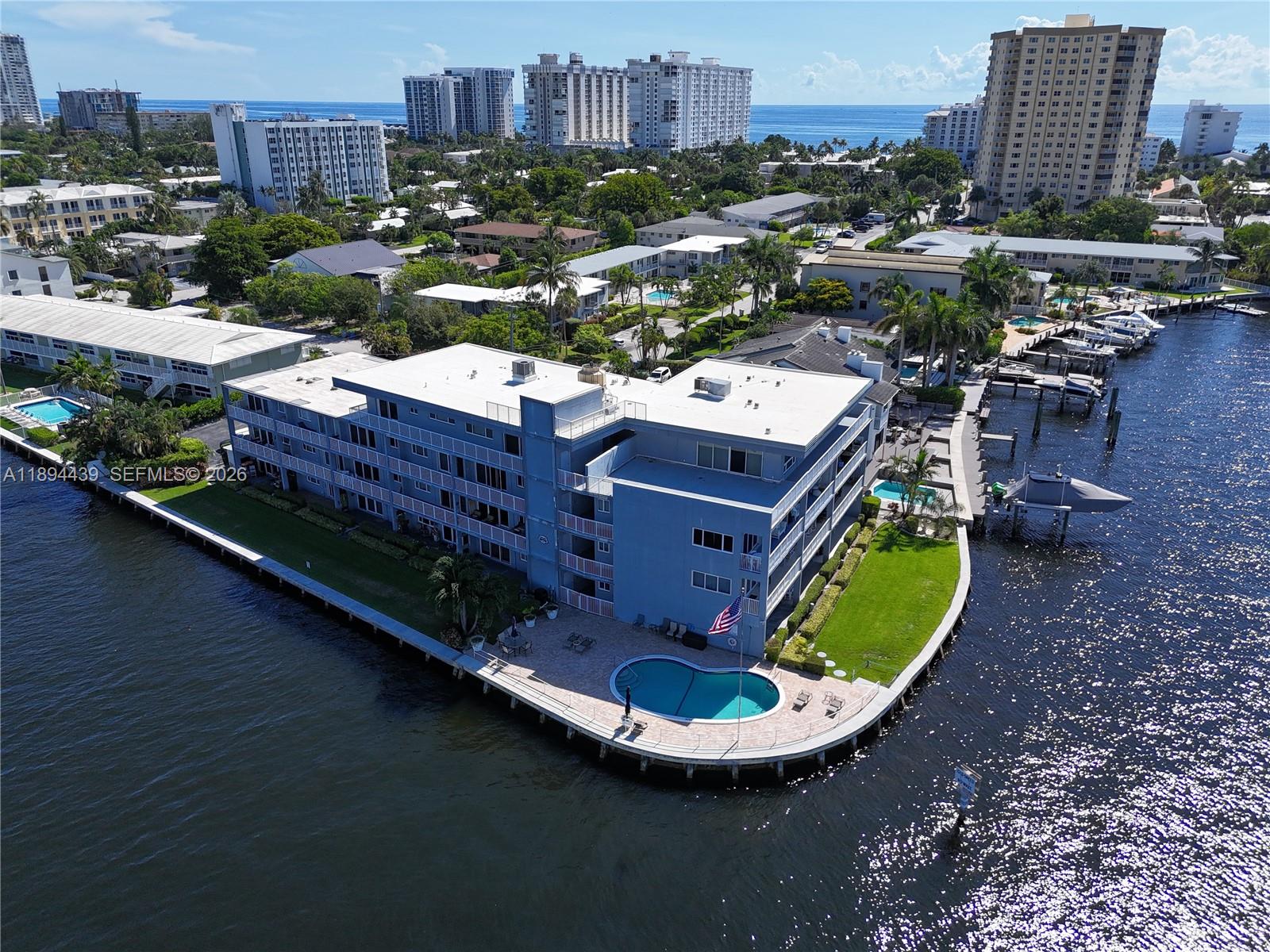 Breathtaking Waterfront Living! Enjoy stunning views of the Intracoastal and Lake Santa Barbara from this beautifully updated, professionally decorated coastal-inspired residence. Located in a boutique building on a wide-water point lot, this light-filled unit captures the essence of Florida living.

Inside, the open kitchen features white cabinetry, stainless steel appliances, and a spacious island perfect for cooking and entertaining. The bathroom has been tastefully renovated with a glass-enclosed shower, modern vanity, and ample storage.

Relax by the heated waterfront pool as boats parade along the Intracoastal. Just two blocks from the beach and close to the shops and restaurants of vibrant new Pompano Beach.  Ideal as a vacation retreat or full-time residence.