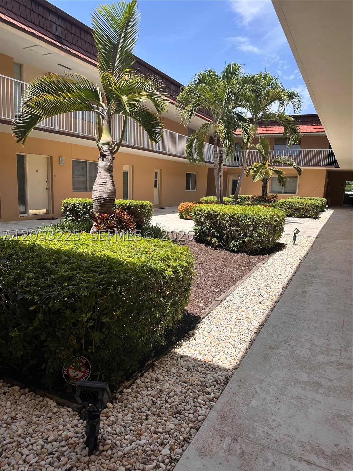 Great location!!! Spacious 2 bedroom/1 full bathroom condo located just off Miller St. & Palmetto Expressway. First floor, clean and freshly painted, small balcony. Ample 2nd bdrm. w/wall closet and plenty of natural lighting. Large living room.  The kitchen is equipped with an electric range and full-size refrigerator. Kitchen door access to hallway in addition to the front door. Low maintenance, Pool and BBQ area. Night guard security. Two assigned parking spaces. Great Investment Opportunity! Low HOA fee of $402 per month. NO RESERVES.