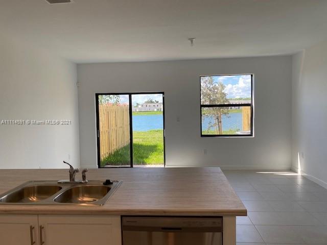 BRAND NEW LAKEFRONT TOWNHOUSE in Crystal Cay!!! CORNER HOUSE with lots of natural light!! 3 bedrooms, 2,5 bathrooms, open kitchen integrated to family room, stainless steel appliances, tile on first floor and carpet on second floor, GREAT LOCATION with easy access to US1, Turnpike, Old Cutler Road. Walk/run on the 7 mile trail with beautiful scenarios + conservation areas  that take you to Black Point Park and Marina.