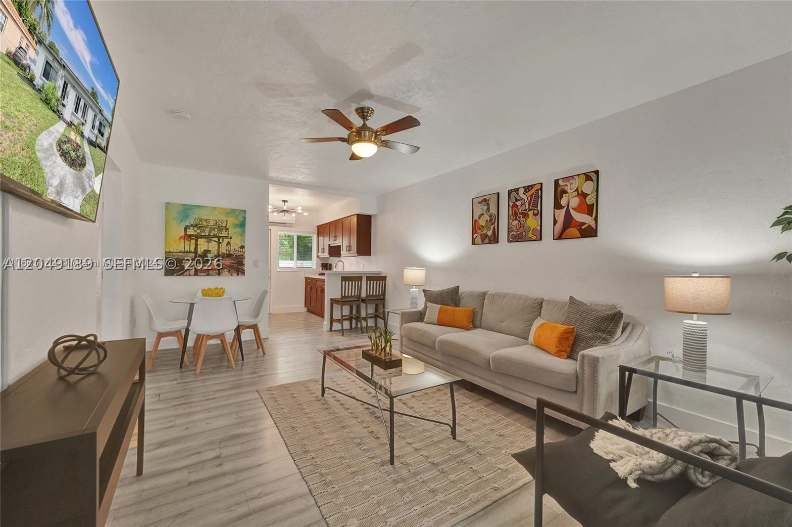 Beautiful 2-bedroom, 1-bathroom unit featuring a full kitchen, a  patio, and convenient on-site laundry. Enjoy the comfort of a dedicated parking space and a functional layout in a great location. Perfect for those seeking a cozy and well-maintained place to call home.