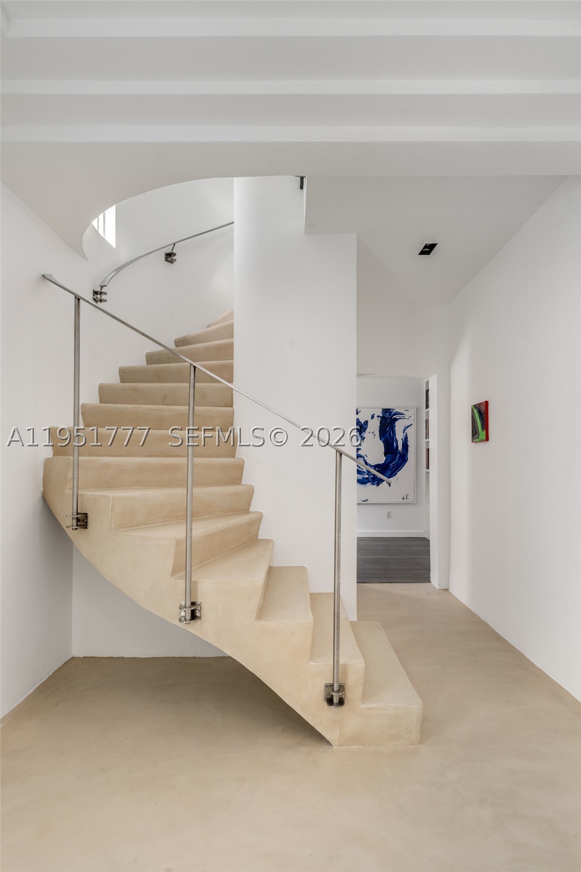 Modern, refined, and beautifully updated, this two-story, three-bedroom residence on Pine Tree Drive blends architectural calm with a warm welcoming aesthetic. Set on a corner lot with dual frontage, the property is fully enclosed by a solid concrete perimeter wall and gated entry, offering exceptional privacy, security and a sense of scale rarely found in dry-lot Miami Beach homes. All exterior elements have been thoughtfully redesigned, including new landscape, hardscape, architectural lighting, and gated entry, creating a composed and serene arrival experience. Inside, bright interiors are highlighted by white beamed ceilings, open living areas, and a clean architectural aesthetic. The upstairs primary suite offers elevated privacy, treetop views, and separation from social spaces, while two additional bedrooms downstairs provide flexibility for guests or office use. The property offers an unusually expansive outdoor environment made possible by its corner-lot setting. Three distinct garden areas—including a front garden, a rear garden with pool, and a private side garden—create a layered sense of openness, light and privacy rarely achievable on mid-block properties. Thoughtfully designed exterior circulation and perimeter walls transform the residence into a true private compound. Ideally located in prime Miami Beach, close to temples, schools, beaches and walkable neighborhood amenities, this is a private and elegant residence defined by design, serenity, and discretion.