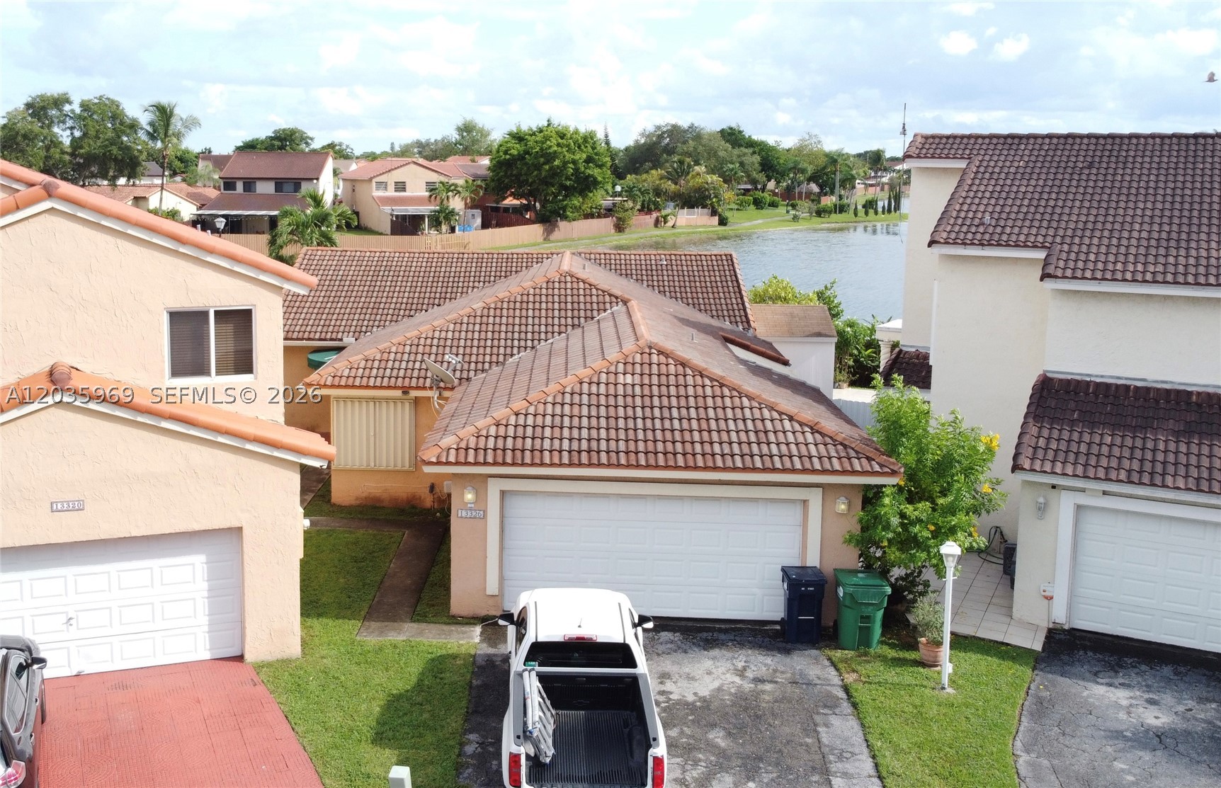 13326 SW 9th Ter. Miami, FL Charming Lakefront Cul-De-Sac Oasis with Ultra-Low HOA! Enjoy perfect privacy and endless entertainment options in this updated, and spacious 3-bedroom home. Tucked safely at the end of a quiet cul-de-sac, this property perfectly blends central convenience with resort-style backyard living. The Property: • Move-In Ready with updated spacious layout. • Storm Ready with full accordion shutters and Hurricane grade French door. • Central Location: Minutes from major expressways for an easy commute. The Backyard Paradise: • Lakefront Views: Unobstructed, pristine views of the water with direct lake path access. • Outdoor Living: Permanent covered Lanai paired with a pergola. • Entertainer’s Dream: Massive yard space built to entertain.