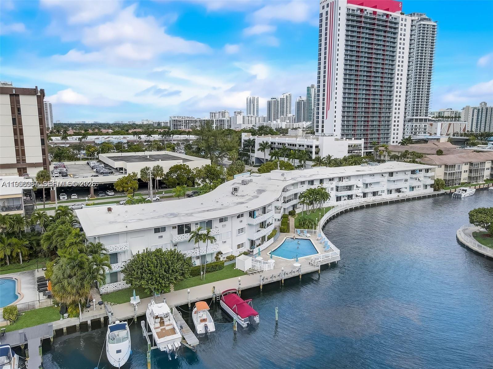 Welcome to Hallandale Beach—an exceptionally rare waterfront find • This beautifully renovated 1st floor, 1-bedroom, 1-bath Intracoastal residence is the best-priced renovated waterfront unit in the area • Offering peaceful marina views just one block from the beach • The unit features a fully renovated kitchen with high-end cabinetry, top-of-the-line new appliances and granite countertops • Along with tile flooring throughout • Hurricane impact windows and doors • New electrical panel • 2025 Hot water heater • Enjoy a double-sized private balcony, perfect for relaxing while watching dolphins, passing boats, and sunny waterfront views • Located in a quiet, well-maintained 55+ waterfront community, residents enjoy a Intracoastal-front pool, picnic and BBQ area, laundry facilities, extra storage, and dock access 30 ft (waitlist) • The building has completed electrical recertification and offers long-term value with a new seawall (2019) • Roof (2015) • Strong reserves over 10% • Lobby includes an elevator • One occupant must be 55+, additional residents may be 18+. Additional highlights include • One assigned parking space directly in front of the unit • Cats & ESA dogs are welcome • No leasing, preserving a peaceful residential setting—family visits welcome • Ideally located near shopping, dining, the beach, Gulfstream Casino, and Aventura Mall, the best of South Florida waterfront living. Furniture negotiable. Co-Op apartment with a proprietary lease- not shares