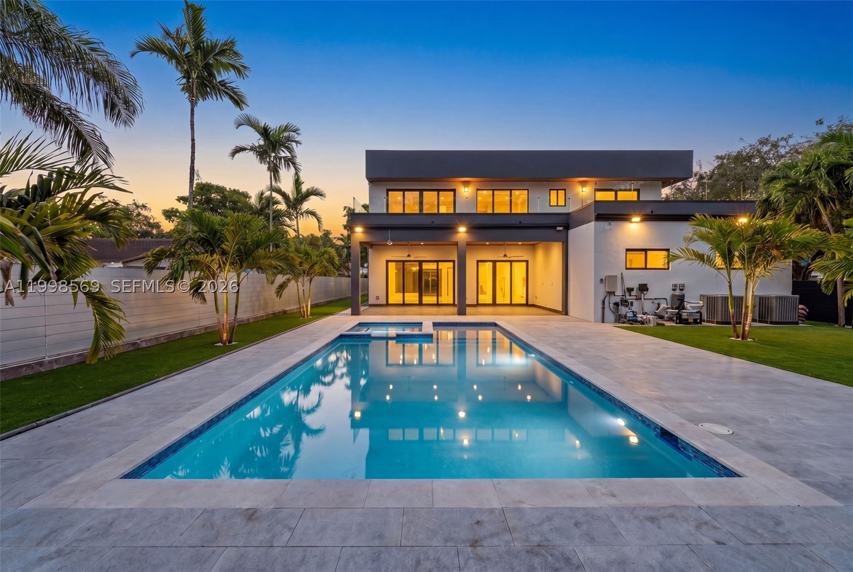 Fortress-level luxury in the heart of Miami Shores. This newly constructed architectural estate is fully completed and move-in ready for immediate occupancy. Built entirely of reinforced concrete, including a commercial-grade concrete roof, the home is engineered well beyond standard residential construction standards, delivering exceptional strength, privacy, durability, and peace of mind.

Offering approximately 4,876 SF, the residence features 4 bedrooms and 4.5 bathrooms, including a full bedroom and bath on the ground floor. Expansive open-concept living spaces create a seamless flow for everyday living and sophisticated entertaining.

The private backyard is designed as a personal retreat, showcasing a 15' x 30' resort-style pool and spa, along with a fully equipped outdoor kitchen. An oversized second-floor terrace further enhances the indoor-outdoor lifestyle.

Developed by an Italian-trained master builder with over 20 years of experience and more than 500 completed projects, this home reflects exceptional European craftsmanship, attention to detail, and structural integrity.

Ideally located within walking distance of Downtown Miami Shores, with the main entrance on 99th Street, this is a rare opportunity to own a new construction luxury residence that is completed, ready for occupancy, and built to stand the test of time.