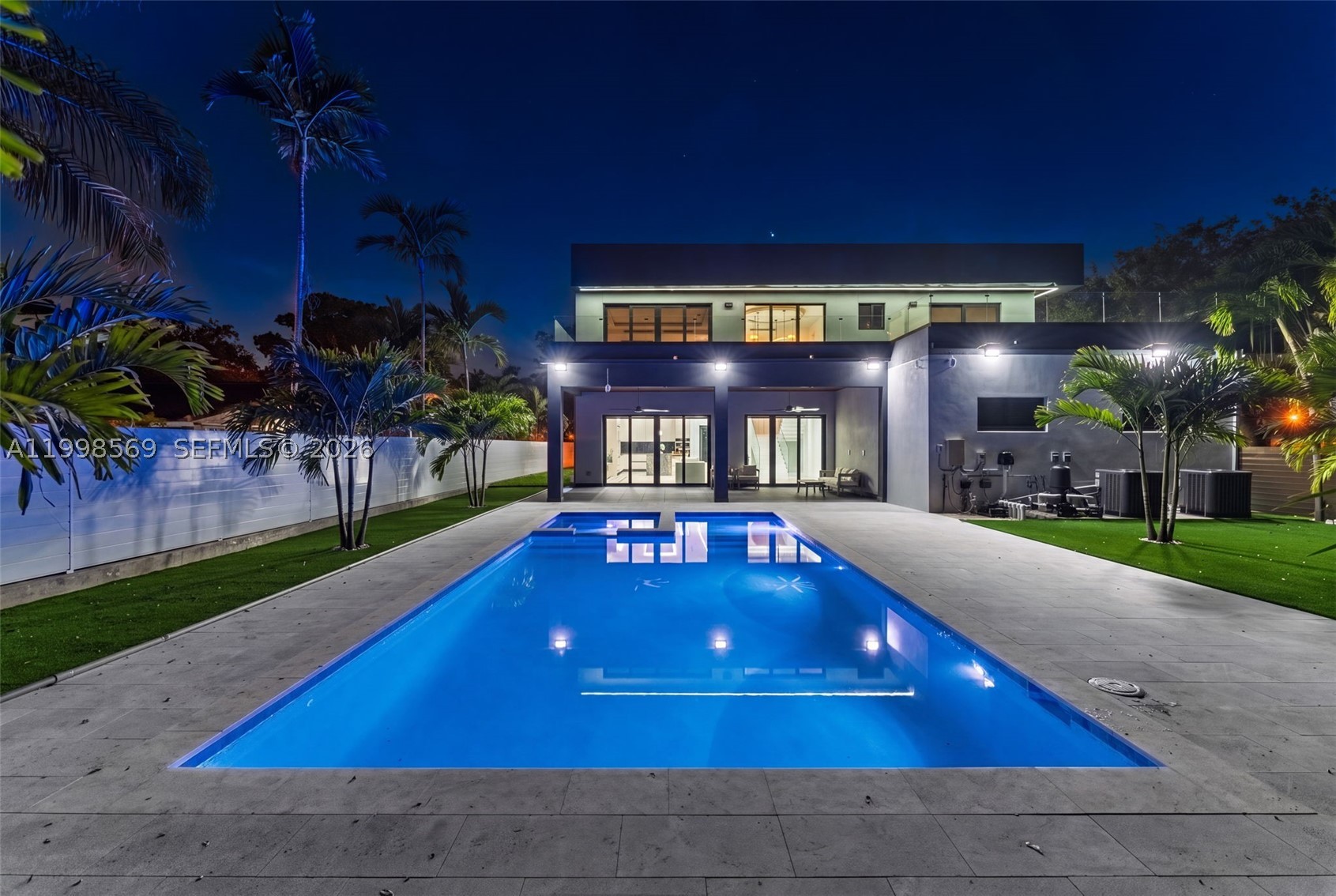 Fortress-level luxury in the heart of Miami Shores. This newly constructed architectural estate is fully completed and move-in ready for immediate occupancy. Built entirely of reinforced concrete, including a commercial-grade concrete roof, the home is engineered well beyond standard residential construction standards, delivering exceptional strength, privacy, durability, and peace of mind.

Offering approximately 4,876 SF, the residence features 4 bedrooms and 4.5 bathrooms, including a full bedroom and bath on the ground floor. Expansive open-concept living spaces create a seamless flow for everyday living and sophisticated entertaining.

The private backyard is designed as a personal retreat, showcasing a 15' x 30' resort-style pool and spa, along with a fully equipped outdoor kitchen. An oversized second-floor terrace further enhances the indoor-outdoor lifestyle.

Developed by an Italian-trained master builder with over 20 years of experience and more than 500 completed projects, this home reflects exceptional European craftsmanship, attention to detail, and structural integrity.

Ideally located within walking distance of Downtown Miami Shores, with the main entrance on 99th Street, this is a rare opportunity to own a new construction luxury residence that is completed, ready for occupancy, and built to stand the test of time.