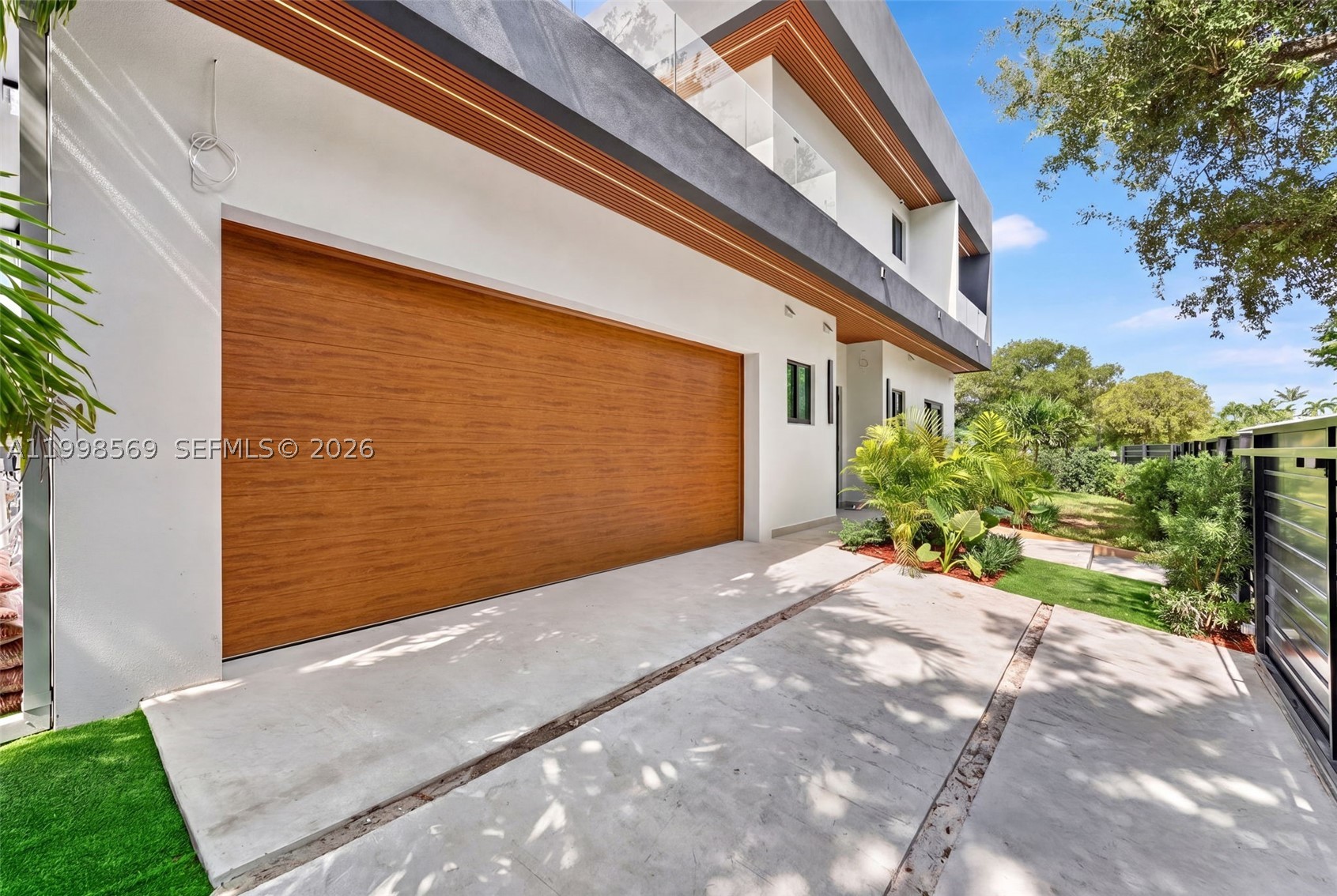 Fortress-level luxury in the heart of Miami Shores. This newly constructed architectural estate is fully completed and move-in ready for immediate occupancy. Built entirely of reinforced concrete, including a commercial-grade concrete roof, the home is engineered well beyond standard residential construction standards, delivering exceptional strength, privacy, durability, and peace of mind.

Offering approximately 4,876 SF, the residence features 4 bedrooms and 4.5 bathrooms, including a full bedroom and bath on the ground floor. Expansive open-concept living spaces create a seamless flow for everyday living and sophisticated entertaining. With a 4,000 square foot back area back yard, pool area, easy to fit outside 50-100 people eperfect for gatherings.

The private backyard is designed as a personal retreat, showcasing a 15' x 30' resort-style pool and spa, along with a fully equipped outdoor kitchen. An oversized second-floor terrace further enhances the indoor-outdoor lifestyle.

Developed by an Italian-trained master builder with over 20 years of experience and more than 500 completed projects, this home reflects exceptional European craftsmanship, attention to detail, and structural integrity.

Ideally located within walking distance of Downtown Miami Shores, with the main entrance on 99th Street, this is a rare opportunity to own a new construction luxury residence that is completed, ready for occupancy, and built to stand the test of time.