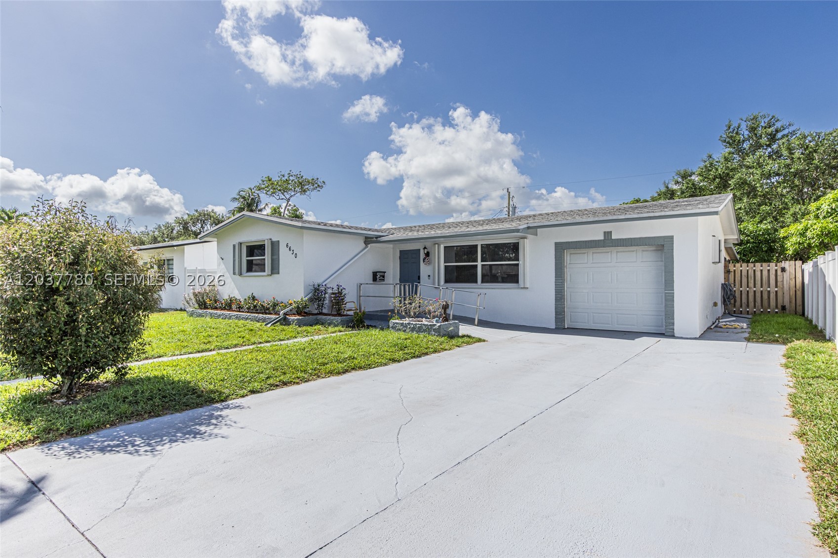 Very well-maintained 3-bedroom, 2-bathroom home featuring a 1-car garage and 1,407 square feet under air. This move-in-ready property offers a screened-in patio, complete hurricane protection, updated kitchen and bathrooms, and no cast iron pipes. Major updates include a 2016 roof, 2025 air conditioner, and 2024 water heater, providing peace of mind for years to come. Conveniently located near the world-famous Hard Rock, Fort Lauderdale-Hollywood International Airport, shopping, dining, entertainment, and major highways, this home combines comfort, convenience, and value. Don't miss this exceptional opportunity!