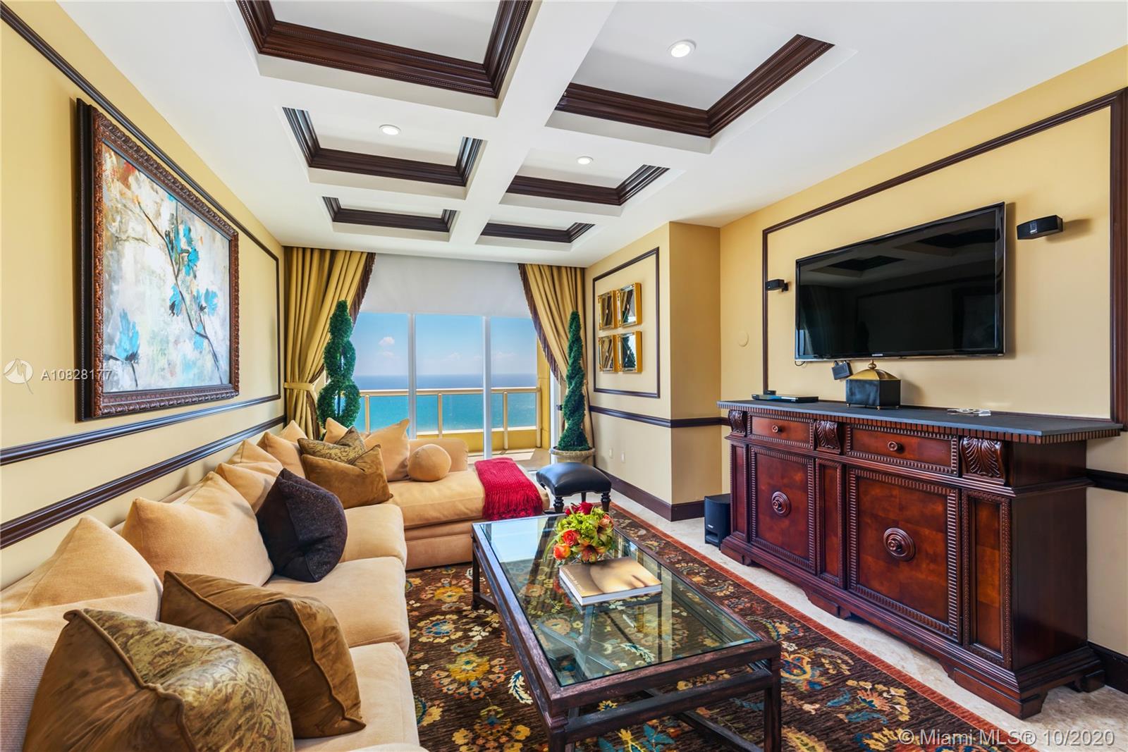 Luxurious Penthouse Apartment located in the Exclusive 5 Diamond Acqualina Residence & Resort, Sunny Isles Beach FL. Featuring top of the line appliances, custom cabinetry and closets, 5 bed, full guest suite, 6.5 bath PH, HUGE living room, eat in kitchen, family room & staff room all professionally designed and decorated by Steve G. Magnificent wrap around terraces with breathtaking ocean and intra-coastal views. Five Star amenities for you to enjoy, fabulous restaurants, lavish Acqualina Spa by ESPA, 3 crystal clear pools with pool side service, poolside restaurant & bar, plus room service available to your unit. Your Hotel Home