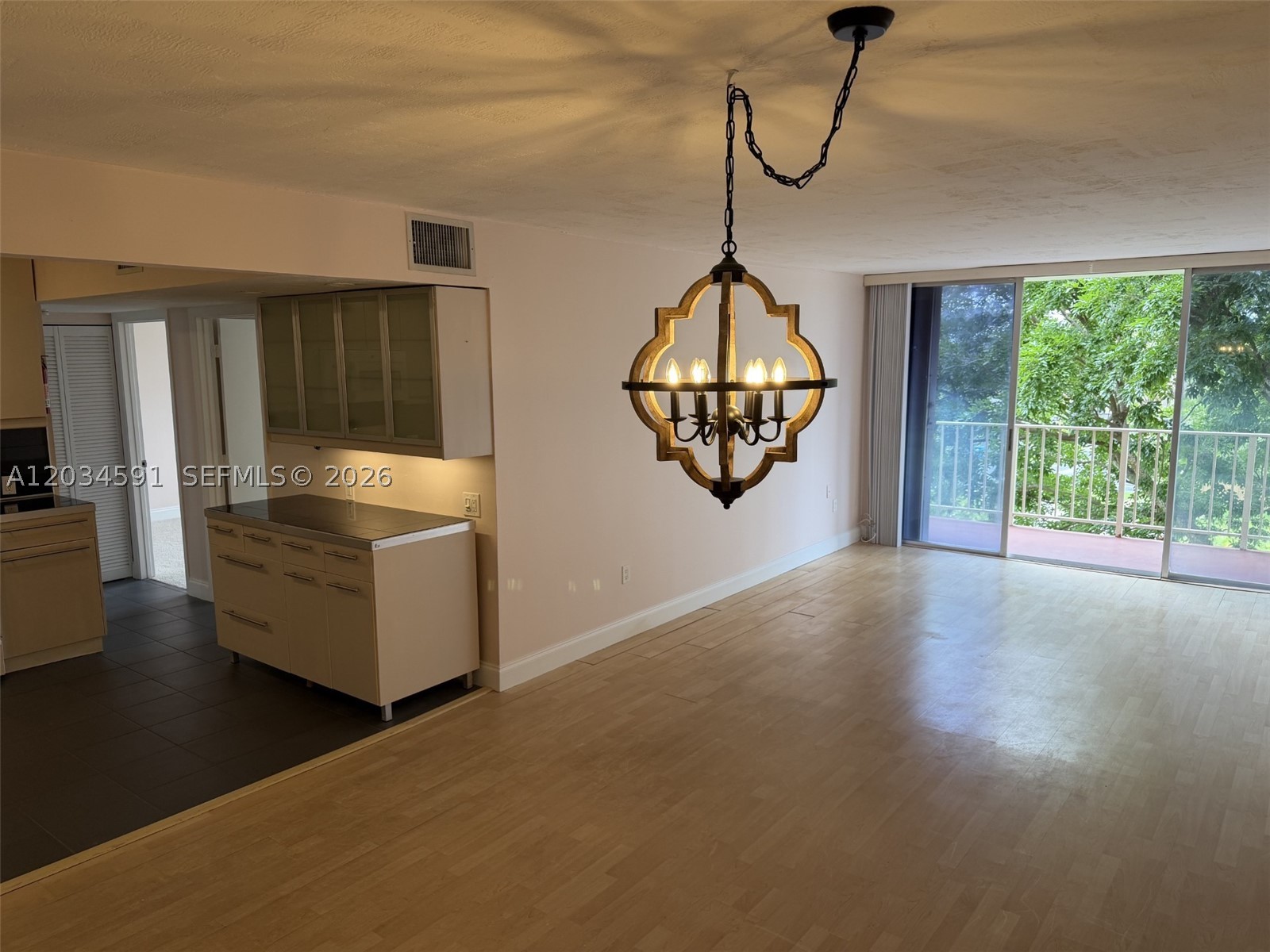 Highly Desirable (2-bedroom, 1-bath) END unit in the B Bldg at the VILLAGE AT THE FALLS Condos with EXPANDED Kitchen, NEW AC in 2025, ACCORDION Hurricane Shutters & 1 RESERVED parking spot. Community offers a Gym, Clubhouse, Security, Pool, Tennis Courts and a Full-Time On-Site Manager. LOCATION, LOCATION, LOCATION – situated near Pinecrest / Palmetto Bay and just across the street from NEW Publix, Upscale Shopping and Restaurants at The Falls Mall.