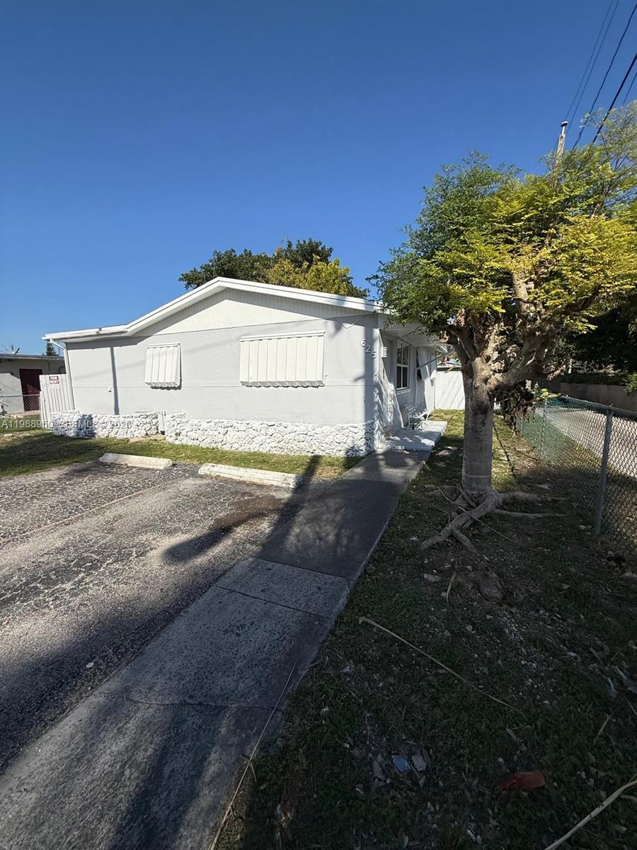 COMPLETELY REMODELED 3-bedroom, 1-bath single-family home in the heart of Homestead. Features porcelain tile in kitchen, bathroom, and living areas, vinyl flooring in bedrooms, and stainless steel appliances. Includes full-size washer/dryer, laundry room, and extra storage. Enjoy a large fenced backyard in a quiet neighborhood, conveniently located near top schools, the Turnpike, Keys Outlet Mall, and the Florida Keys. Section 8 welcome. Text listing agent for showing instructions.