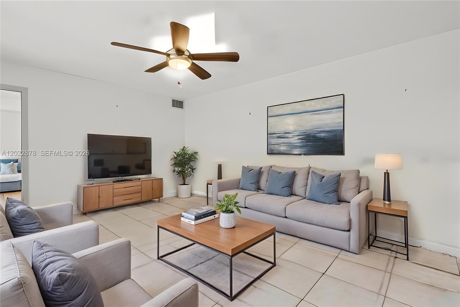 Beautiful corner-unit townhome located in the highly desirable Village at Harmony Lakes, offering a spacious and thoughtfully designed layout in one of the area’s most sought-after communities. This impressive residence features 2 bedrooms, 2.5 bathrooms, plus a versatile den that can easily function as a 3rd bedroom, home office, or guest space. With a 2023 Roof and 1,628 square feet of living space, the home provides the comfort, flexibility, and layout today’s buyers are looking for. The completely remodeled bathrooms are absolutely stunning, featuring modern finishes and a luxurious spa-like feel throughout. Residents of Harmony Lakes enjoy resort-style amenities including a community pool, tennis, basketball and racquetball courts, playground, and covered BBQ pavilion. Ideally located near major highways, top-rated schools, shopping, dining, grocery stores, beaches, and everything South Florida has to offer. 2 parking spots. Pets allowed. Annual rentals allowed. Some photos Ai staged.
