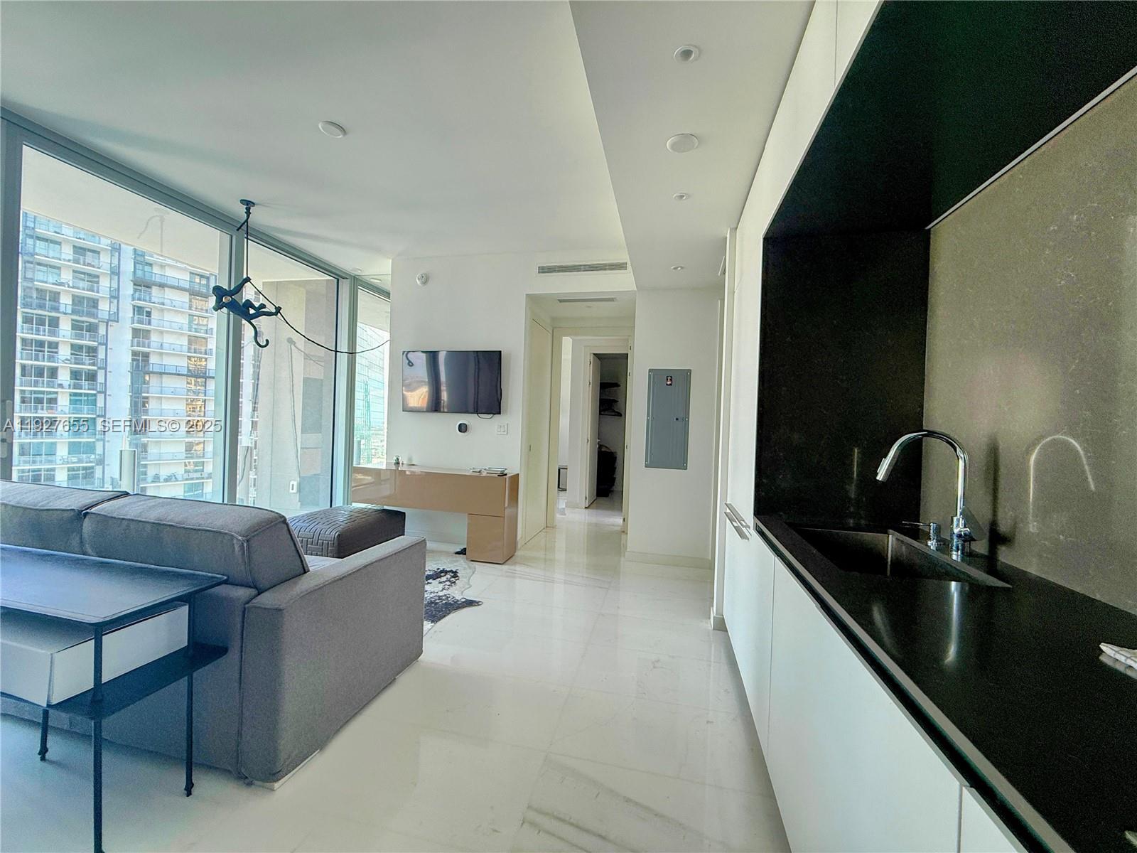 Iconic 33rd-Floor Custom Residence | Aston Martin Residences
Experience panoramic city and bay views from this meticulously upgraded 1BD + 1 1/2 bathrooms home. Featuring custom millwork, an open-concept layout, and access to world-class amenities including a full-service spa and indoor pools this is luxury waterfront living, perfected.