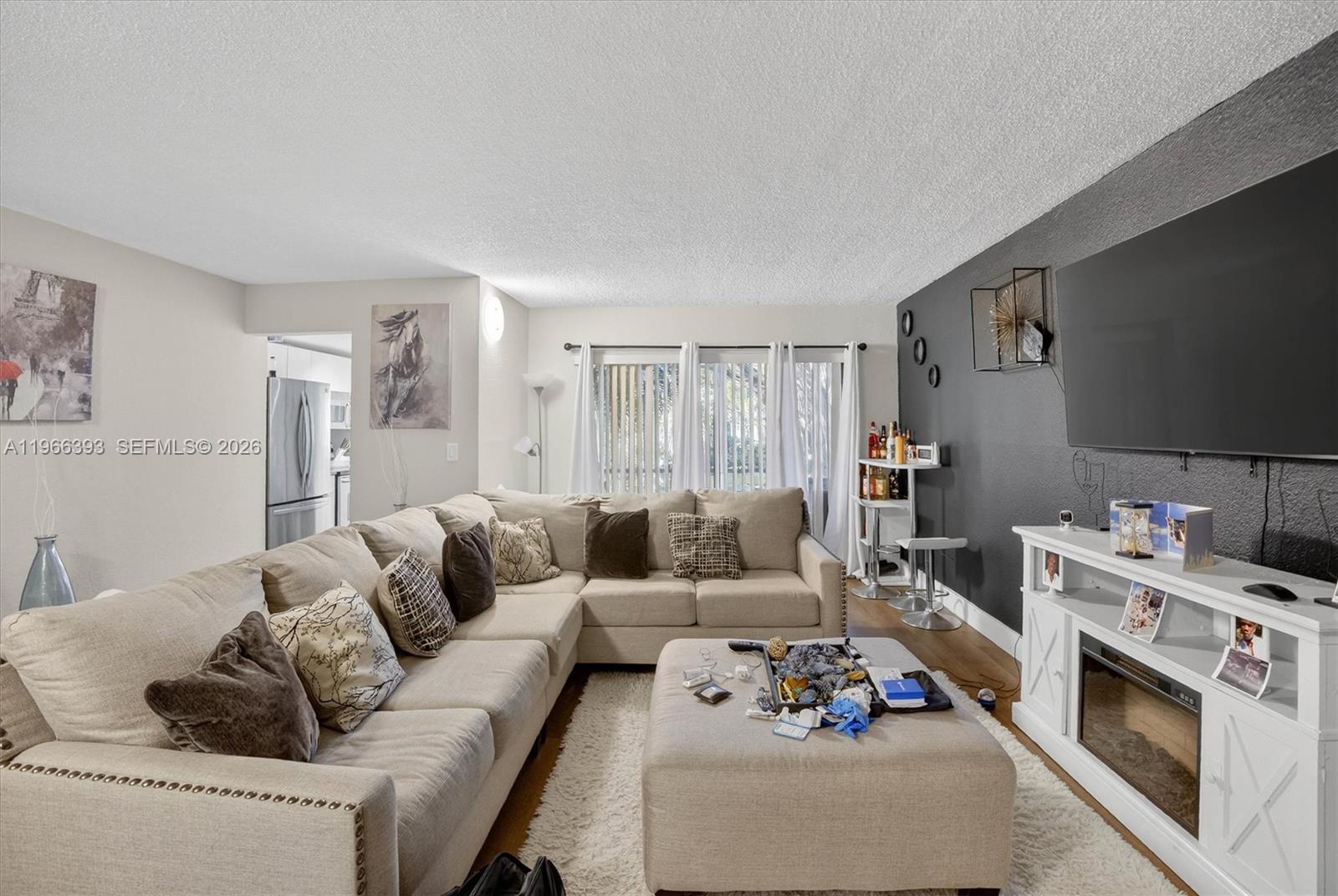 Welcome Home! 1 bedroom, 1 bathroom condo unit is truly impressive in all ages community. The sleek & contemporary design elements create a stylish and inviting atmosphere. The kitchen boasts top of the line appliances and chic countertops. Washer & dryer, the bedroom is cozy yet spacious, and the updated fixtures add a touch of luxury. With its open concept layout & clever use of space, the unit floor plan layout feels larger than its size. A Must See! This modern gem offers the perfect combination of comfort & sophistication. The living area leads into an enclosed patio & peaceful garden outdoor space. One assigned parking in front of the unit, plus tons of guest parking. You'll be delighted to call this remodeled condo your new home! Association has reserves. Seller Is Motivated