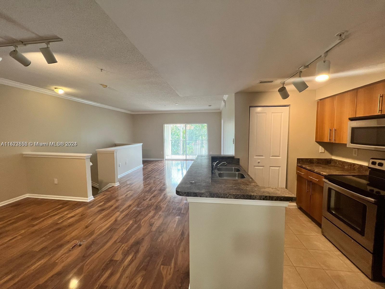 EL-AD POINCIANA CONDO - Residential