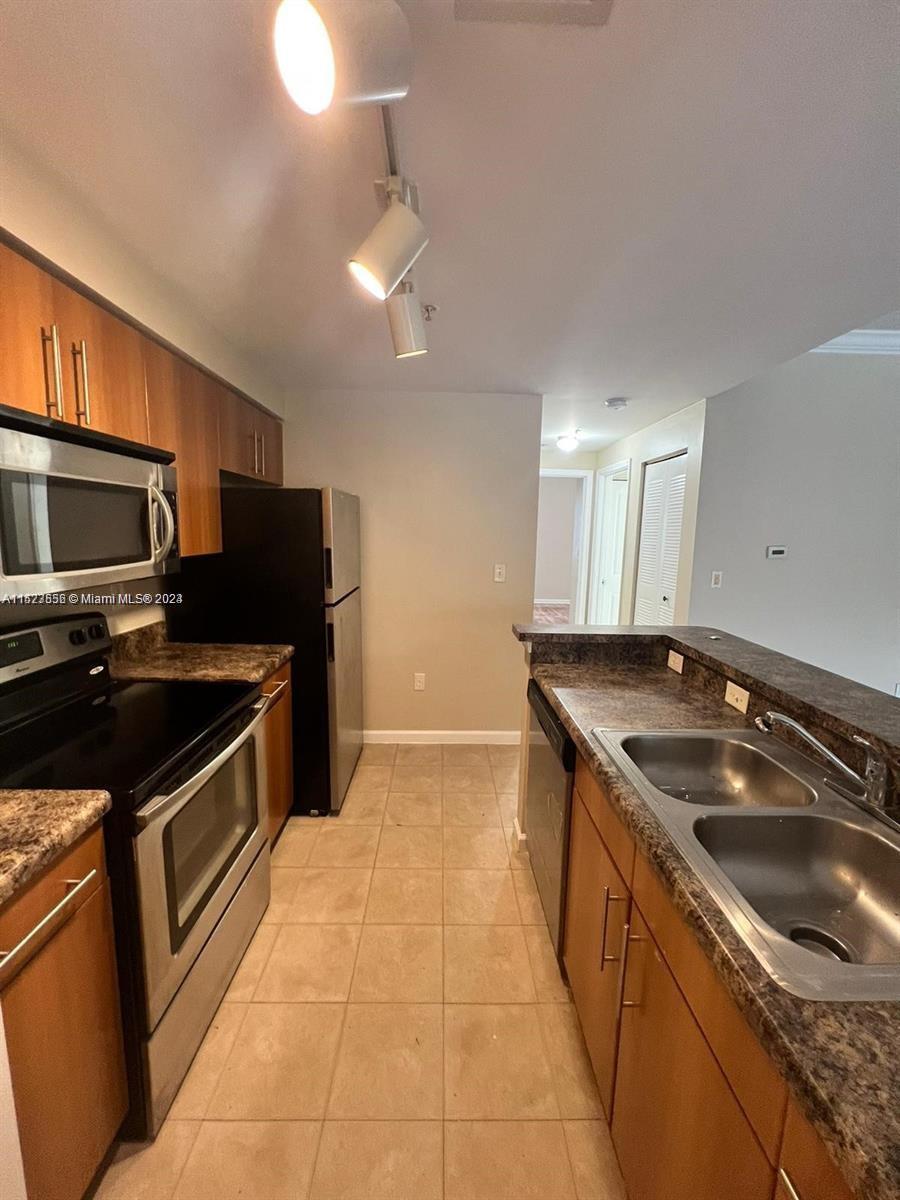 EL-AD POINCIANA CONDO - Residential