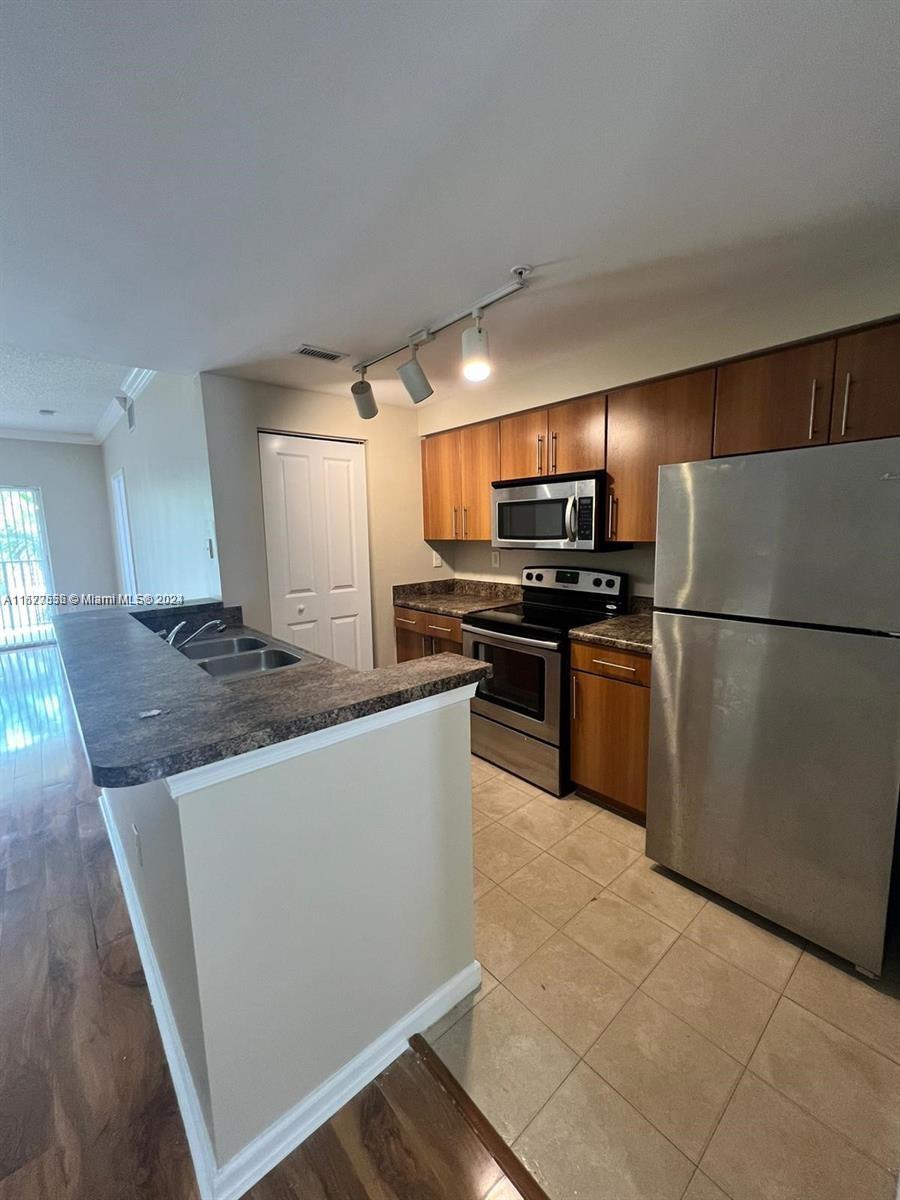 EL-AD POINCIANA CONDO - Residential