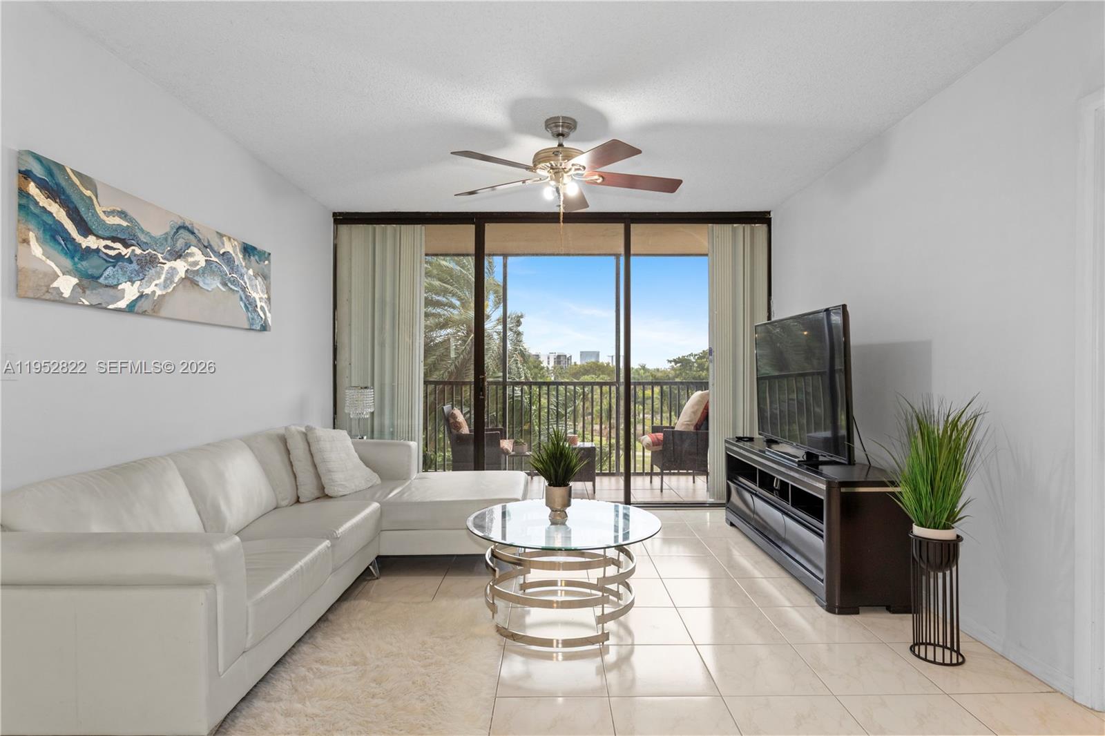 Welcome to one of the best values in Coronado! This 2-bedroom, 2-bath residence is centrally located in the heart of Aventura with picturesque views of the Aventura Golf Course. Enjoy close proximity to Aventura Mall, Whole Foods, PetSmart, Target, Waterways Shops & Marina, Publix, kosher supermarkets, the beach, restaurants, and more. Freshly painted and filled with natural light, the unit features an expansive living and dining area that extends to the balcony, with the kitchen just off the main space. Both bedrooms offer en suite baths and golf course views. Amenities are open and operating, including the reopened pool and upgraded gym. Includes 1 storage unit, 1 assigned garage space, and 1 guest space.