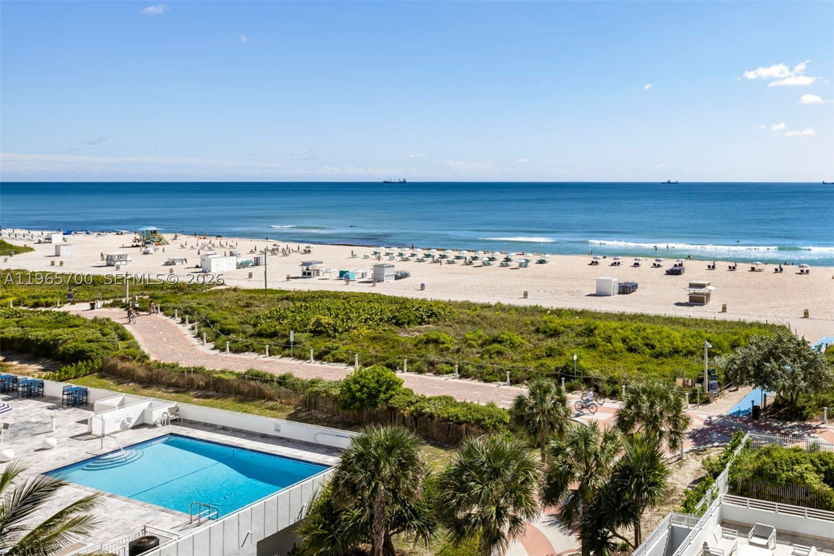 Wake up to ocean views this winter in the heart of South of Fifth, Miami Beach’s most coveted oceanfront neighborhood. This light-filled studio offers a rare NE ocean view from a private balcony, creating an ideal coastal retreat just steps from the sand. The unit is thoughtfully designed for comfort and efficiency, kitchen equipped with smart appliances, Nest thermostat with central A/C and heat, new impact windows, brand-new flooring, and a sleek modern bath. Smart home features keep owners connected effortlessly, whether you’re home or away. Newly installed expansive sliding glass doors bring in natural light and ocean breezes, seamlessly connecting the living space to the freshly renovated balcony. Own 1 of 10 Studios available in the building, keeping your monthly maintenance expenses the lowest. The building recently completed major capital improvements, including the exterior, balconies, roof, pool deck with shower, fitness center, and a gated backyard fence around the landscaped beachfront grounds with footbath. Additional enhancements are part of the building’s long-term modernization plan, including renovated spa-style gym/pool bathrooms and saunas. Enjoy direct beach access and walkable proximity to South Pointe Park and South of Fifth’s celebrated dining scene, including Joe’s Stone Crab, Carbone, and Smith & Wollensky. A rare opportunity to own a smart, oceanfront residence in South of Fifth — perfect as a pied-à-terre, beach escape, or refined full-time home.