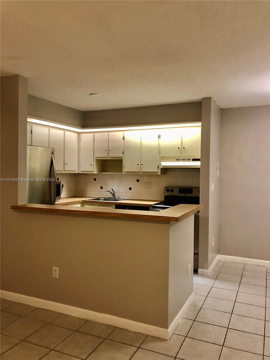 TAMARAC GARDENS CONDOMINI - Residential