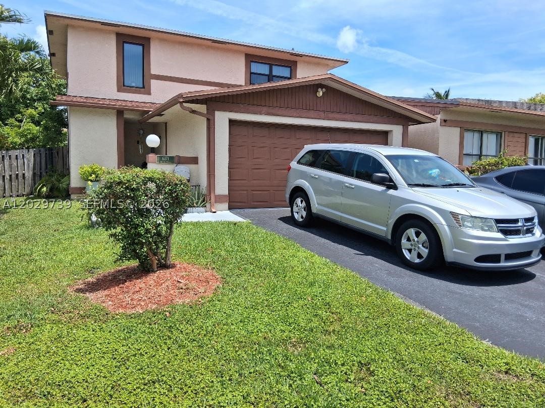 Well maintained two story home in a very desirable area of SUNRISE...property  has impact windows and doors,the a/c is two years old.The roof is also two years old.