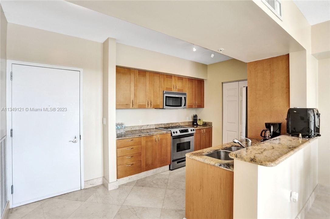 DUO CONDOMINIUM EAST - Residential