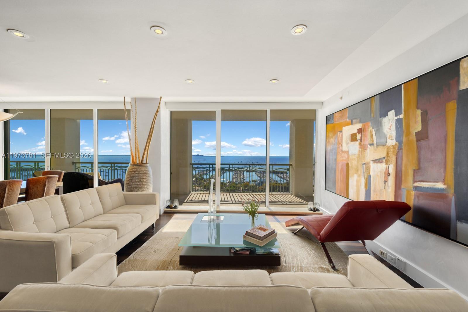 Introducing an exceptional 3-bedroom, 2-bath residence at The Ritz-Carlton Residences, Coconut Grove—where refined design and effortless luxury come together in the heart of Coconut Grove.

Thoughtfully curated with a modern-century aesthetic, this residence blends clean architectural lines with warm, sophisticated finishes. Floor-to-ceiling impact glass fills the interiors with natural light, creating a seamless flow between the expansive living spaces and the stunning views of Biscayne Bay and the lush Grove canopy.

The open-concept layout is ideal for both elegant entertaining and comfortable everyday living. A sleek chef’s kitchen, complete with premium appliances, custom cabinetry, and stone countertops, anchors the space beautifully. The primary suite offers a serene retreat with a spa-like bath and generous closets, while two additional bedrooms provide flexibility for guests, family, or a private office.

Residents enjoy the legendary services and amenities synonymous with The Ritz-Carlton—resort-style pool and spa, state-of-the-art fitness center, concierge, valet, and 24-hour security—delivering an unmatched level of comfort and care.

Perfectly positioned in one of Miami’s most coveted waterfront neighborhoods, this is a home created for those who expect nothing less than the very best.
