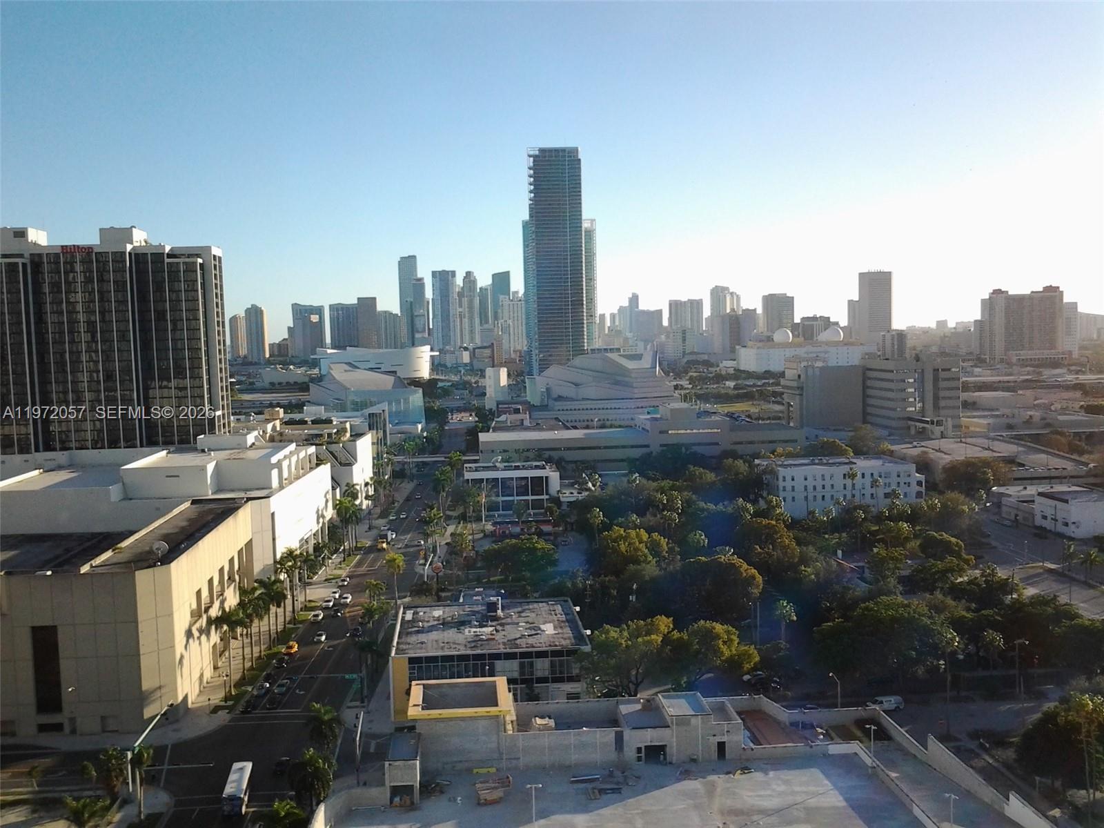 Wake up to breathtaking sunrise views and unwind each evening with spectacular sunsets from your own private retreat in the sky. This high-floor residence offers sweeping panoramic vistas of the city skyline, the sparkling waters of the bay, and the Port of Miami. Enjoy front-row seats to Downtown’s exciting growth, including the striking new architectural landmark rising in the heart of the city.