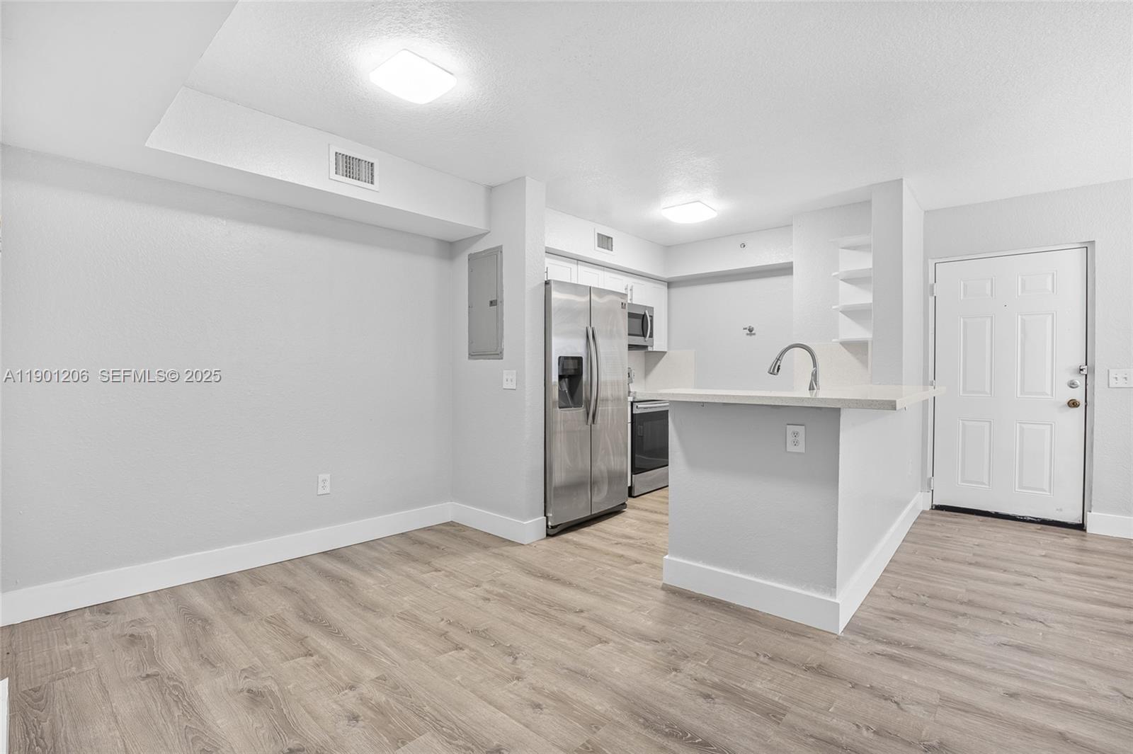 Beautifully updated 2-bedroom, 2-bath condo in the gated community of Vista Trace! This spacious second-floor unit features an open layout with plenty of natural light, modern flooring, and a renovated kitchen with stainless steel appliances and ample cabinet space. The primary suite includes a walk-in closet and private bath. Enjoy the convenience of an in-unit washer and dryer, a private balcony, and assigned parking. Community amenities include a pool, clubhouse, and playground. Conveniently located near shopping, dining, schools, and major highways. Move-in ready and easy to show!
