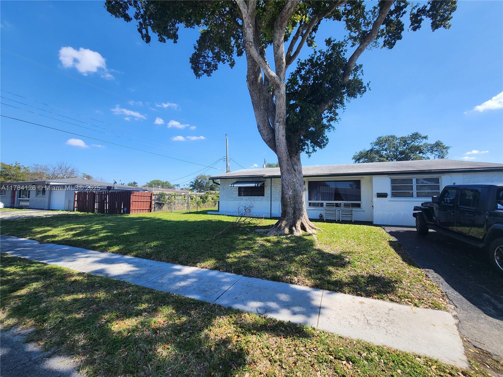 Come see this amazing corner lot home in Hollywood. With some updates property can reach it's maximum value.