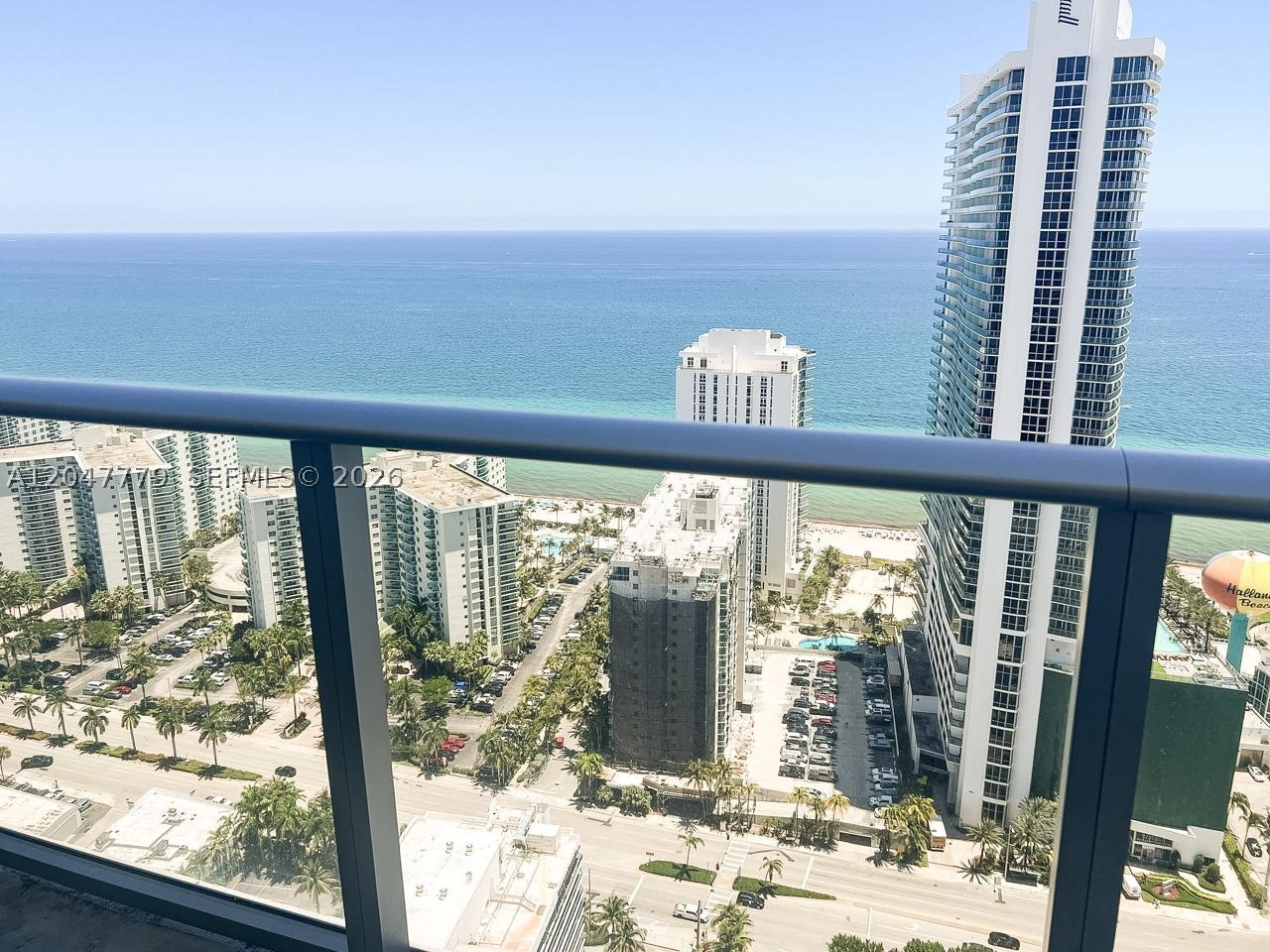 Live above it all on the 35th floor of Hyde Beach House, Hollywood Beach's premier oceanfront condo-hotel. This fully furnished 2-bedroom, 2-bath residence offers 1,146 SF of living space with sweeping ocean and city skyline views from a private terrace, floor-to-ceiling impact glass, and an open living/dining layout. NO RENTAL RESTRICTIONS — this unit sits on the unrestricted-residential side of the building, ideal for owner use, seasonal stays, or short-term rental income at your discretion. Five-star resort amenities include three heated pools, private beach club access, state-of-the-art fitness center, spa, rooftop lounge, tennis and racquetball courts, 24-hour concierge, and complimentary valet. The maintenance fee covers electricity, cable, internet, and water for effortless ownership. Concrete block construction, impact windows throughout, and secured lobby access add peace of mind. Turnkey, move-in ready, and positioned in one of Broward's most desirable beachfront addresses — a rare combination of flexibility and five-star lifestyle. Schedule your private showing today.