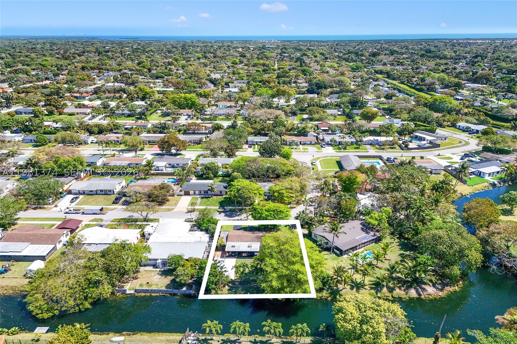 Welcome to your private waterfront retreat in the heart of Palmetto Bay. This beautifully maintained 3-bedroom, 2-bath canal-front home offers the perfect blend of comfort, security, and South Florida lifestyle living.
Situated on a tranquil canal, this property provides peaceful water views and the opportunity to enjoy kayaking, paddleboarding, or simply relaxing in your own backyard oasis.  Inside, the home features impact windows for hurricane protection and insurance savings, updated bathrooms with modern finishes, and a well-maintained interior that reflects true pride of ownership. The functional 3/2 layout offers comfortable living spaces filled with natural light.  The home also includes a 1-car garage and a covered carport for a boat or RV, offering ample parking and additional storage space. Located in a highly desirable neighborhood known for larger lots and strong community appeal, this property offers exceptional value for a waterfront home in Palmetto Bay. Canal-front opportunities at this price point are limited — schedule your private showing today.