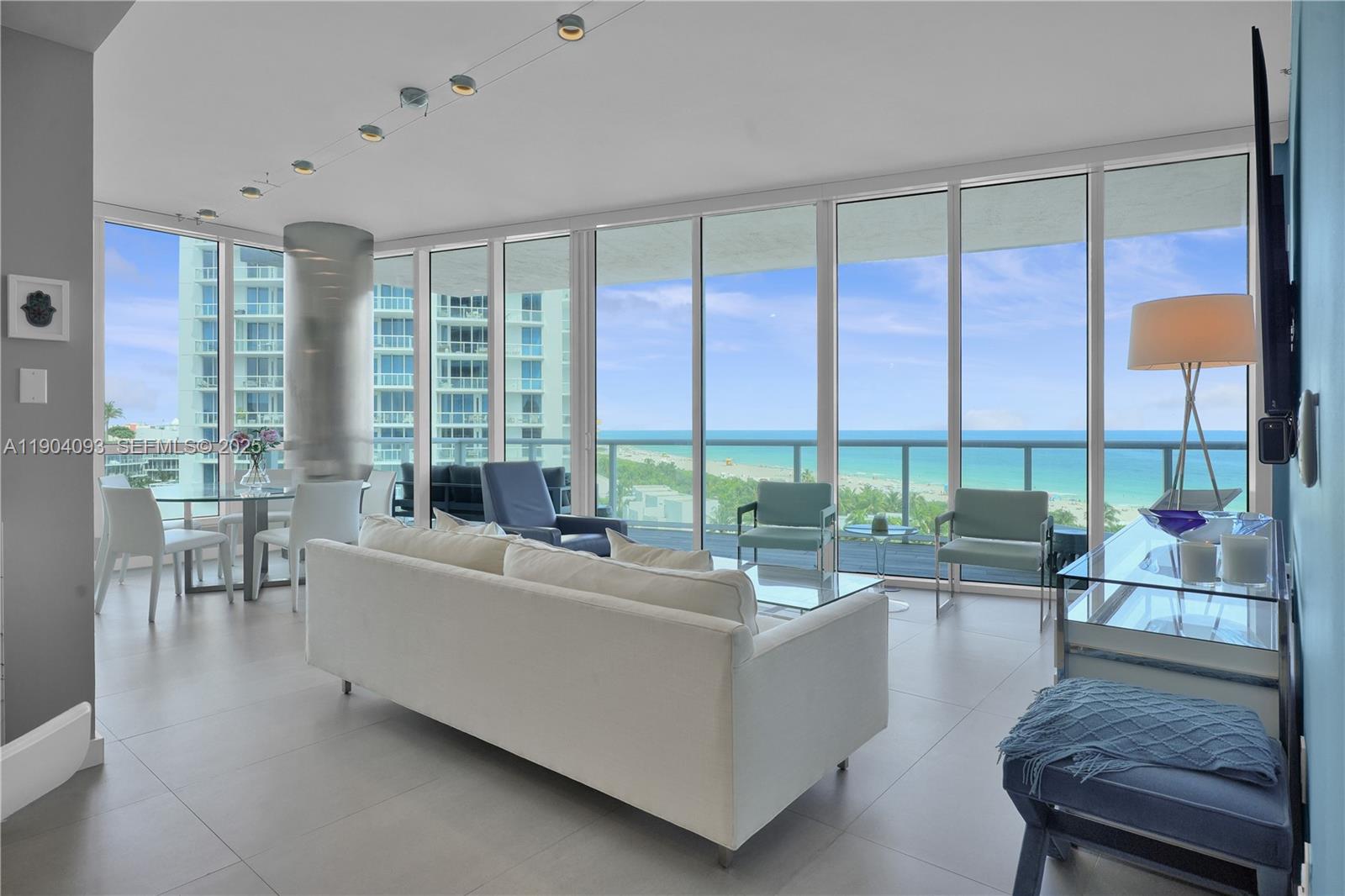 BEST PRICED oceanfront corner residence at Continuum South Beach - Assessment FULLY PAID! This meticulously remodeled 2BD/2.5BA showplace spans 1,595 SF with streamlined design framing stunning ocean views. Custom gourmet kitchen features kitchen island, quartz counters, Miele convection ovens & SubZero appliances. Oversized oceanfront terrace overlooks South Beach coastline and iconic South of Fifth tip.
Experience Continuum's 12.5-acre beachfront sanctuary: 1,000 feet of pristine oceanfront, private beach club, al-fresco Italian restaurant, three clay tennis courts, two lagoon pools plus rooftop lap pool, 23,000 SF spa/fitness center with daily classes. Exclusive south tower corner unit delivers luxury resort living with assessment fully satisfied.